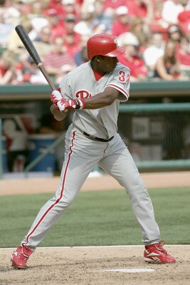 ST. LOUIS, MO - APRIL 10:  Outfielder Jose Offerman #33 of the Philadelphia Phillies swings at a St. Louis Cardinals pitch during the game at Busch Stadium on April 10, 2005 in St. Louis, Missouri. The Phillies defeated the Cards 13-4. (Photo by Dilip Vis