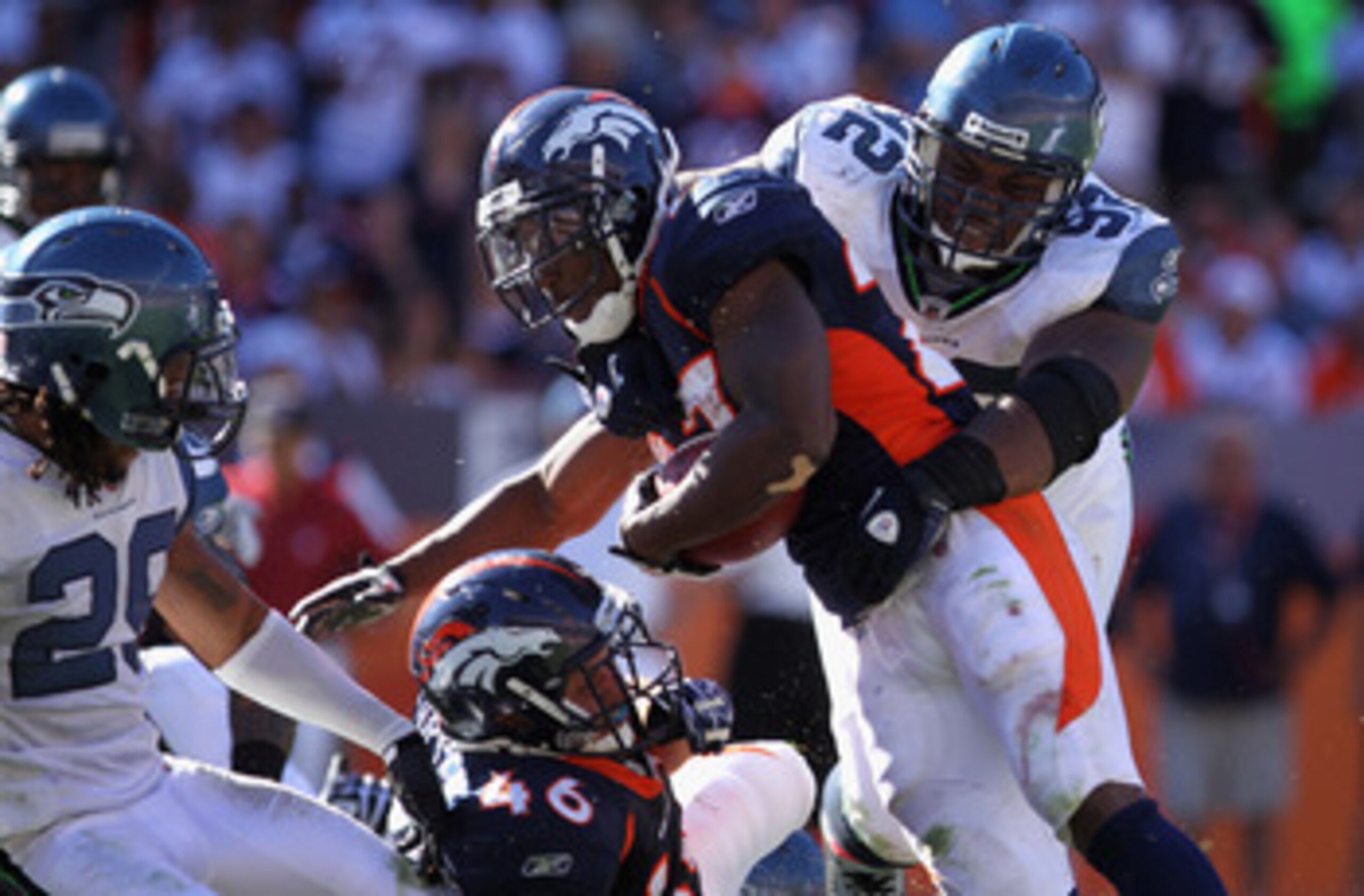 DENVER - SEPTEMBER 19: Running back Knowshon Moreno #27 of the Denver Broncos is stopped by defensive tackle Brandon Mebane #92 of the Seattle Seahawks at INVESCO Field at Mile High on September 19, 2010 in Denver, Colorado. The Broncos defeated the Seah DENVER - SEPTEMBER 19: Running back Knowshon Moreno #27 of the Denver Broncos is stopped by defensive tackle Brandon Mebane #92 of the Seattle Seahawks at INVESCO Field at Mile High on September 19, 2010 in Denver, Colorado. The Broncos defeated the Seah