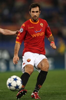 ROME, ITALY - FEBRUARY 16:  Mirko Vucinic of AS Roma in action during the UEFA Champions League round of 16 first leg match between AS Roma and Shakhtar Donetsk at Stadio Olimpico on February 16, 2011 in Rome, Italy.  (Photo by Paolo Bruno/Getty Images)