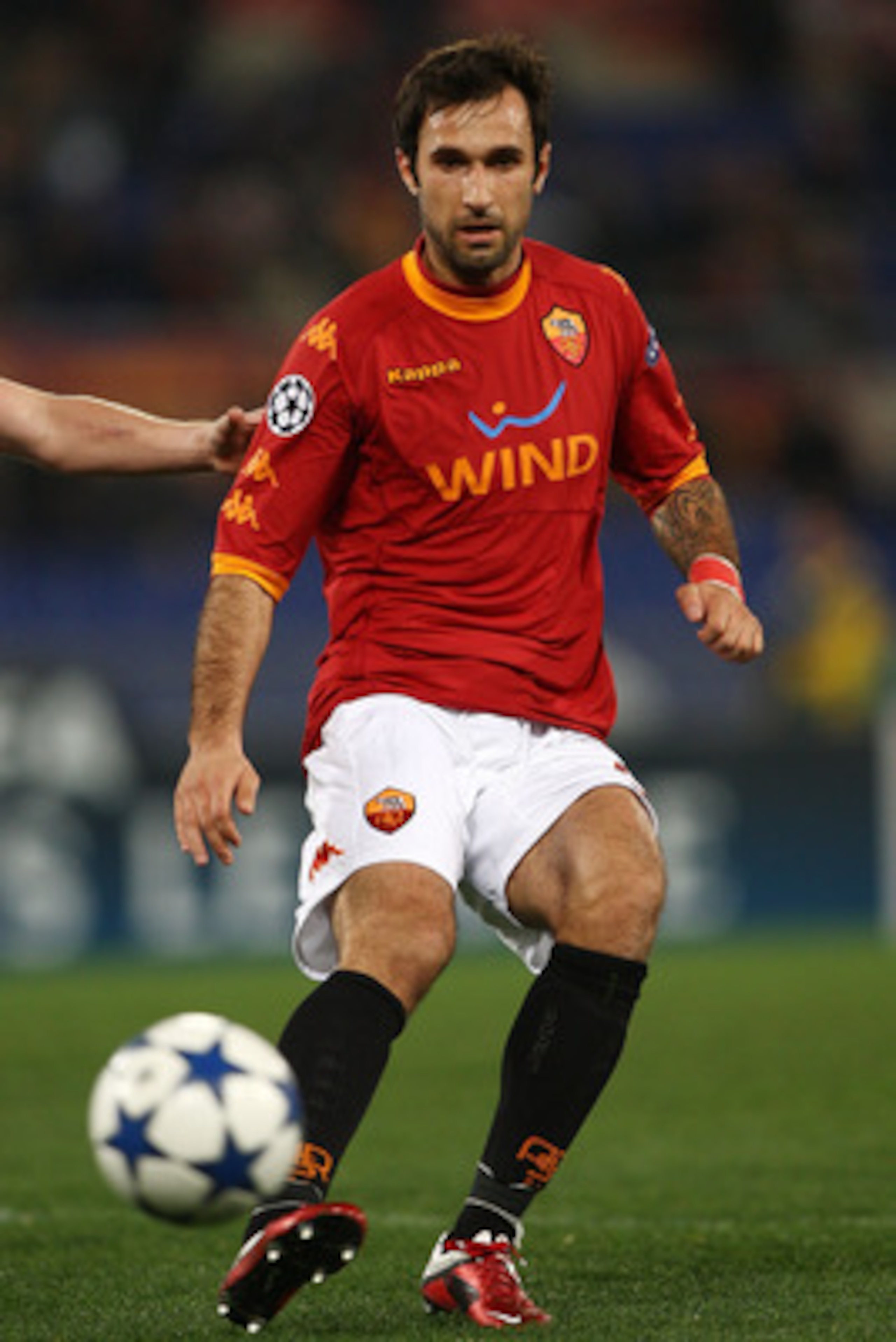 ROME, ITALY - FEBRUARY 16:  Mirko Vucinic of AS Roma in action during the UEFA Champions League round of 16 first leg match between AS Roma and Shakhtar Donetsk at Stadio Olimpico on February 16, 2011 in Rome, Italy.  (Photo by Paolo Bruno/Getty Images)