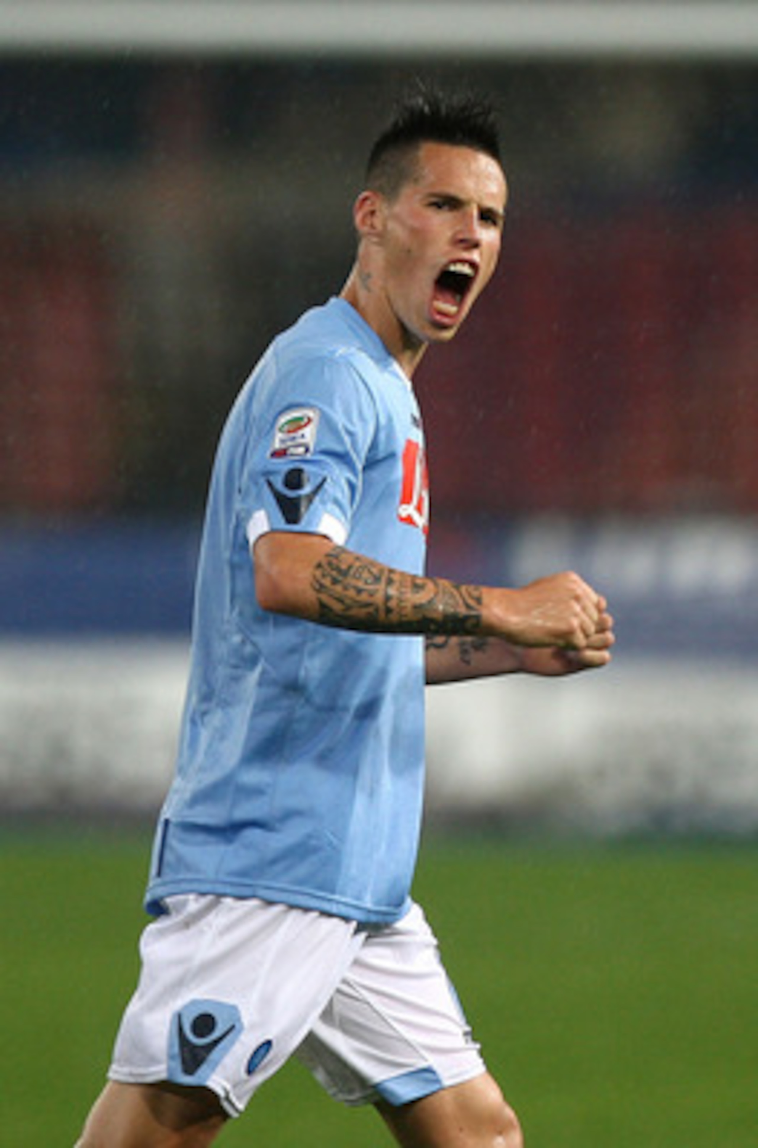NAPLES, ITALY - APRIL 30:  Marek Hamsik of SSC Napoli celebrates after scoring the opening goal during the Serie A match between SSC Napoli and Genoa CFC at Stadio San Paolo on April 30, 2011 in Naples, Italy.  (Photo by Paolo Bruno/Getty Images)