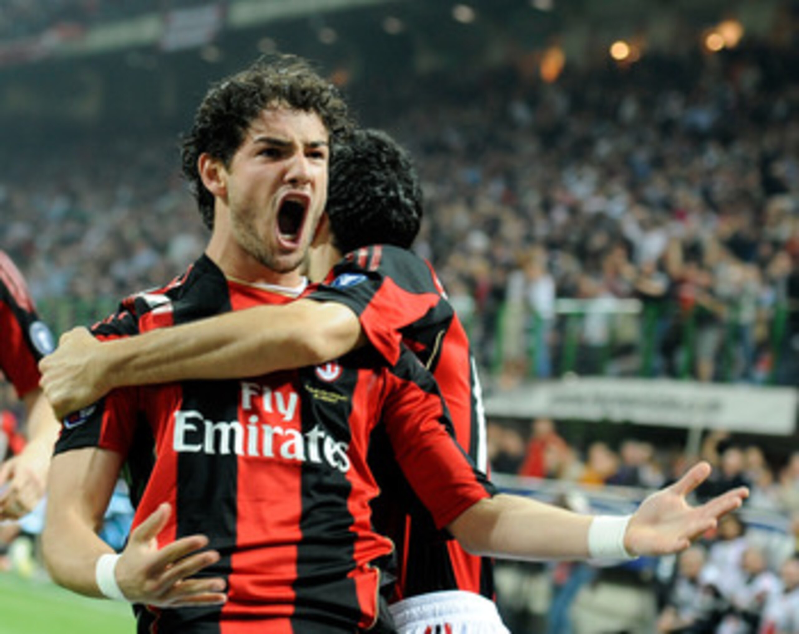 MILAN, ITALY - APRIL 02:  Alexandre Pato of AC Milan celebrates scoring the first goal during the Serie A match between AC Milan and FC Internazionale Milano at Stadio Giuseppe Meazza on April 2, 2011 in Milan, Italy.  (Photo by Claudio Villa/Getty Images