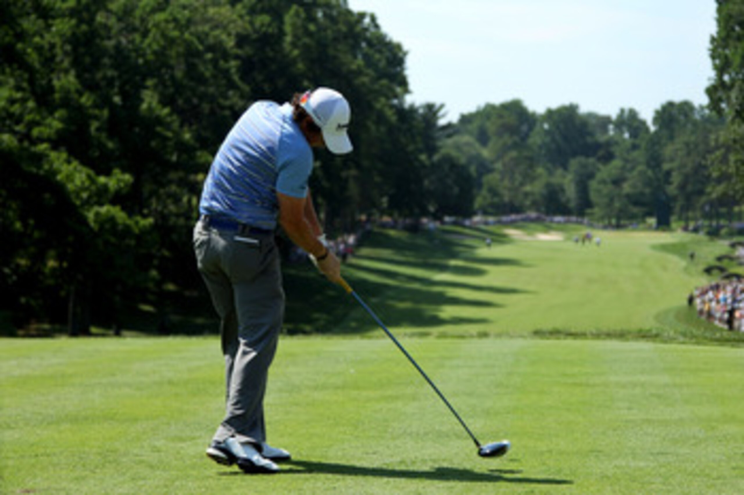 BETHESDA, MD - JUNE 17: Rory McIlroy of Northern Ireland hits his tee shot on the 11th hole during the second round of the 111th U.S. Open at Congressional Country Club on June 17, 2011 in Bethesda, Maryland. (Photo by Andrew Redington/Getty Images) BETHESDA, MD - JUNE 17: Rory McIlroy of Northern Ireland hits his tee shot on the 11th hole during the second round of the 111th U.S. Open at Congressional Country Club on June 17, 2011 in Bethesda, Maryland. (Photo by Andrew Redington/Getty Images)
