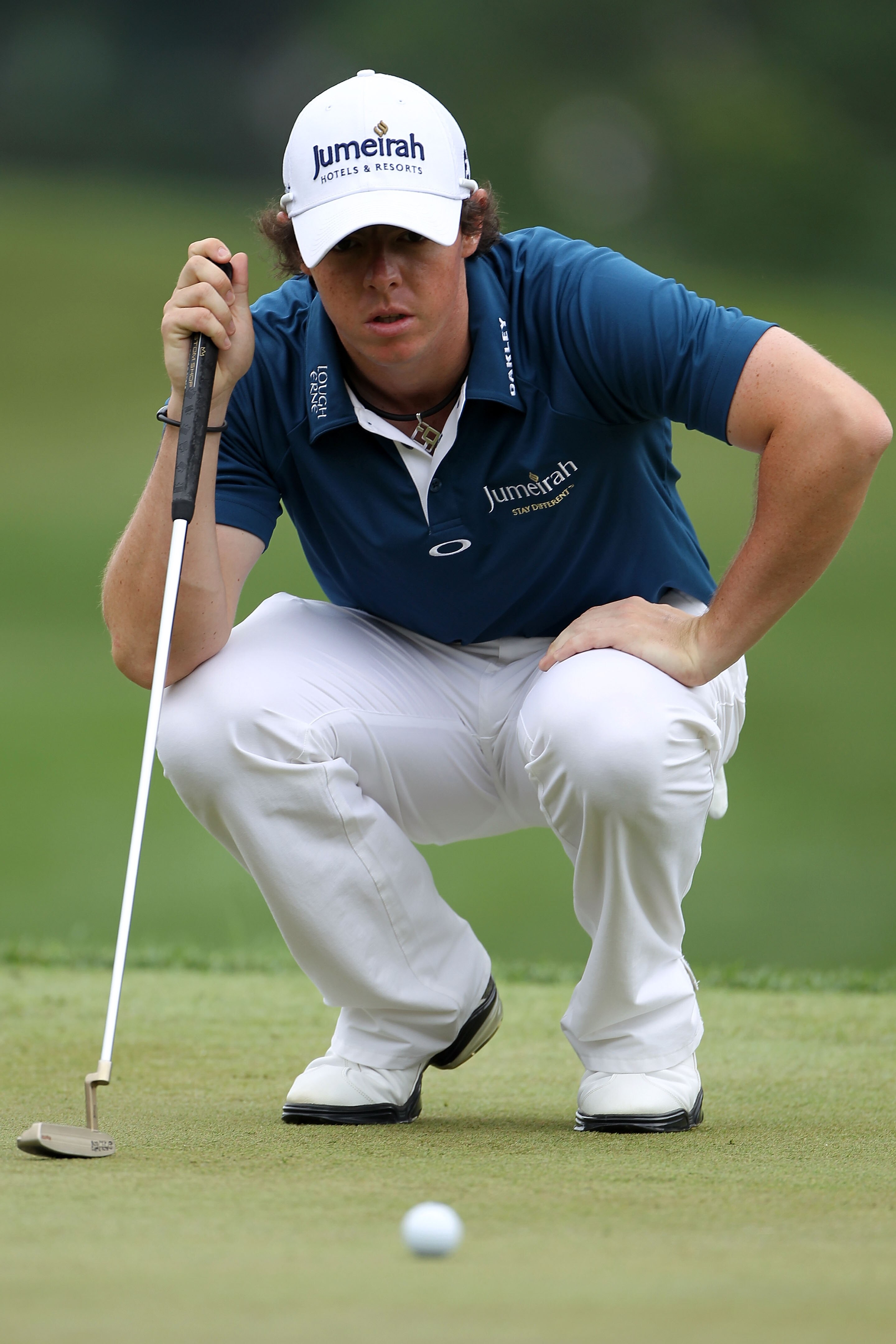 BETHESDA, MD - JUNE 16:  Rory McIlroy of Northern Ireland lines up a putt during the first round of the 111th U.S. Open at Congressional Country Club on June 16, 2011 in Bethesda, Maryland.  (Photo by Jamie Squire/Getty Images)