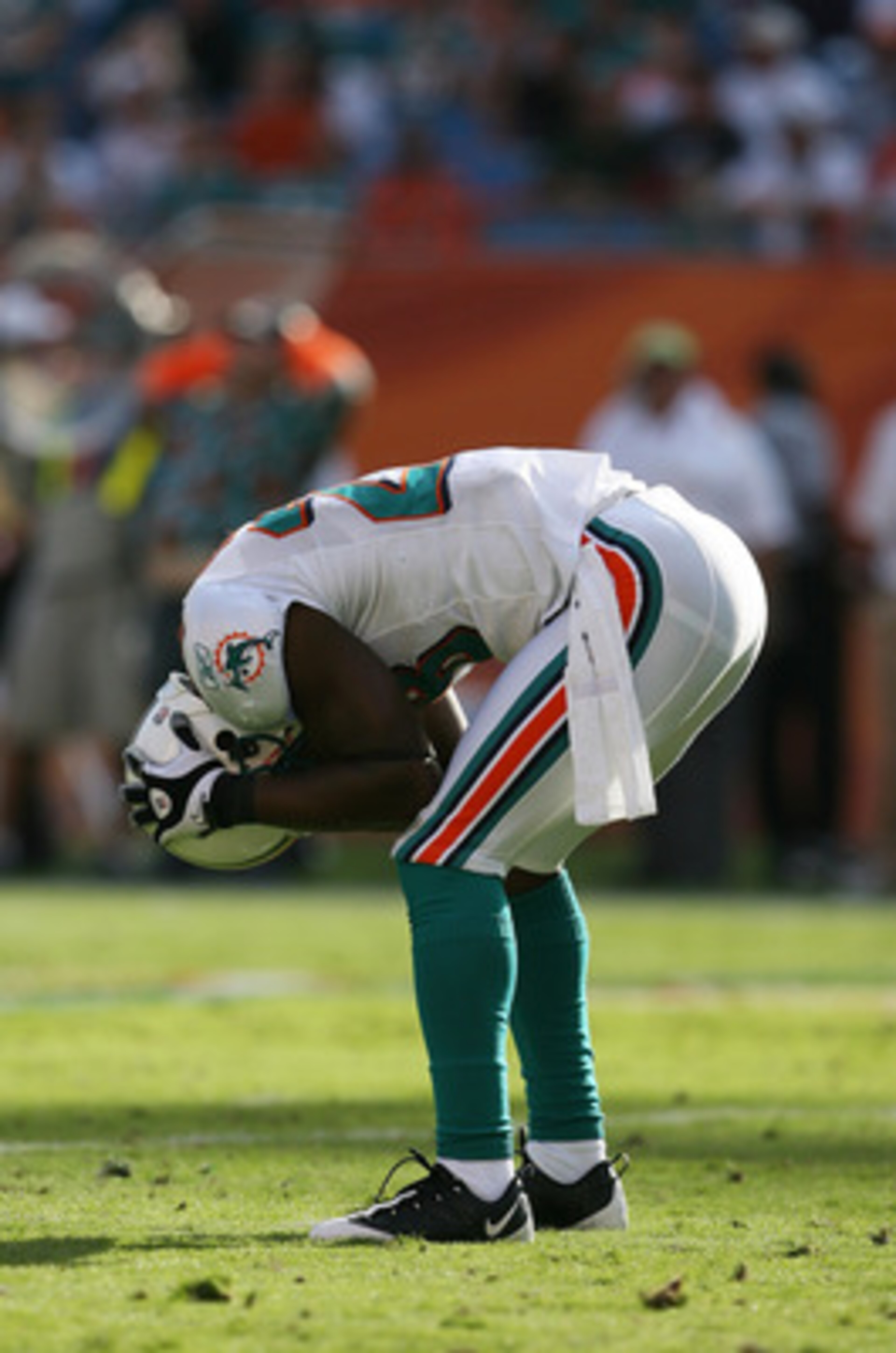 MIAMI - DECEMBER 27:  Safety Gibril Wilson #28 of the Miami Dolphins reacts after dropping an interception that was deflected against the Houston Texans at Land Shark Stadium on December 27, 2009 in Miami, Florida. The Texans defeated the Dolphins 27-20.