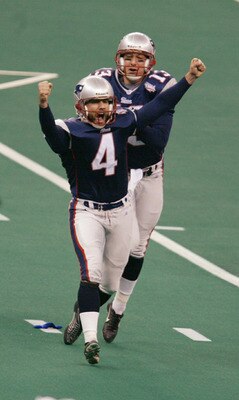 3 Feb 2002:  Kicker Adam Vinatieri #4 of the New England Patriots celebrates after a 48 yard game-winning field goal to win Super Bowl XXXVI, 20-17, beating the St. Louis Rams at the Superdome in New Orleans, Louisiana. DIGITAL IMAGE. Mandatory Credit: Al
