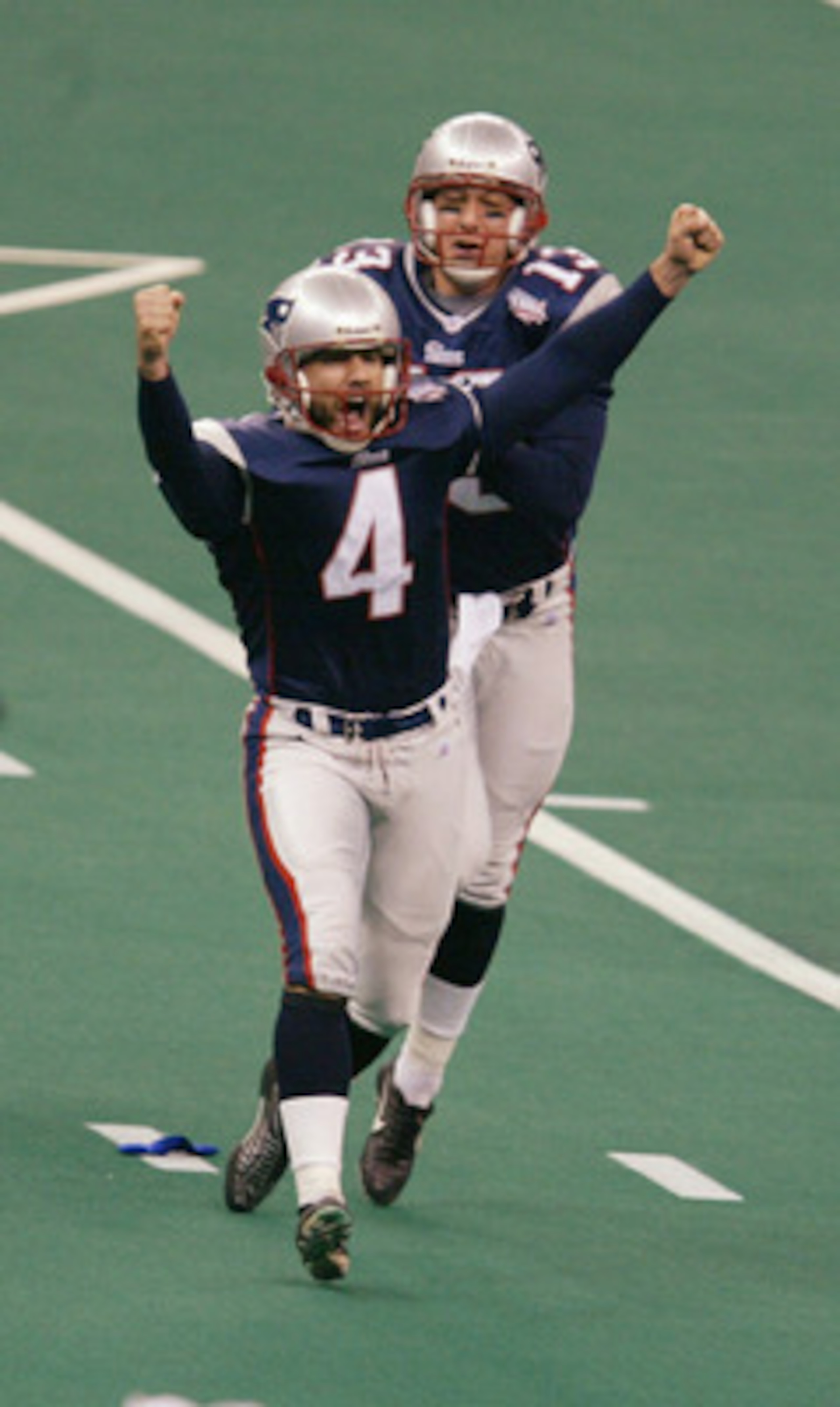 3 Feb 2002:  Kicker Adam Vinatieri #4 of the New England Patriots celebrates after a 48 yard game-winning field goal to win Super Bowl XXXVI, 20-17, beating the St. Louis Rams at the Superdome in New Orleans, Louisiana. DIGITAL IMAGE. Mandatory Credit: Al