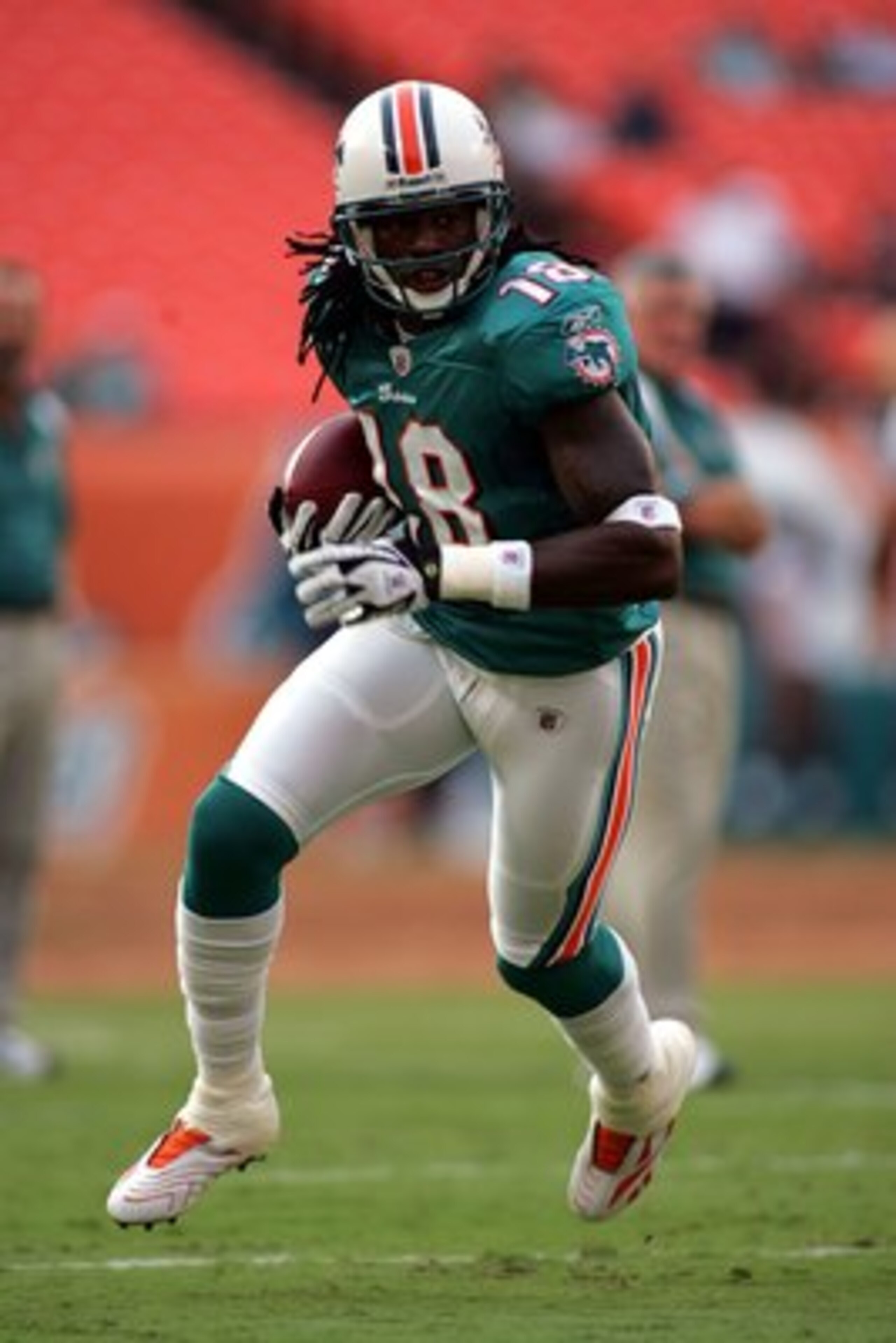 MIAMI - AUGUST 09:  Wide receiver Ernest Wilford #18 of the Miami Dolphins warms up prior to a pre season game against the Tampa Bay Buccaneers on August 9, 2008 at Dolphin Stadium in Miami, Florida. Tampa defeated Miami 17-6.  (Photo by Marc Serota/Getty