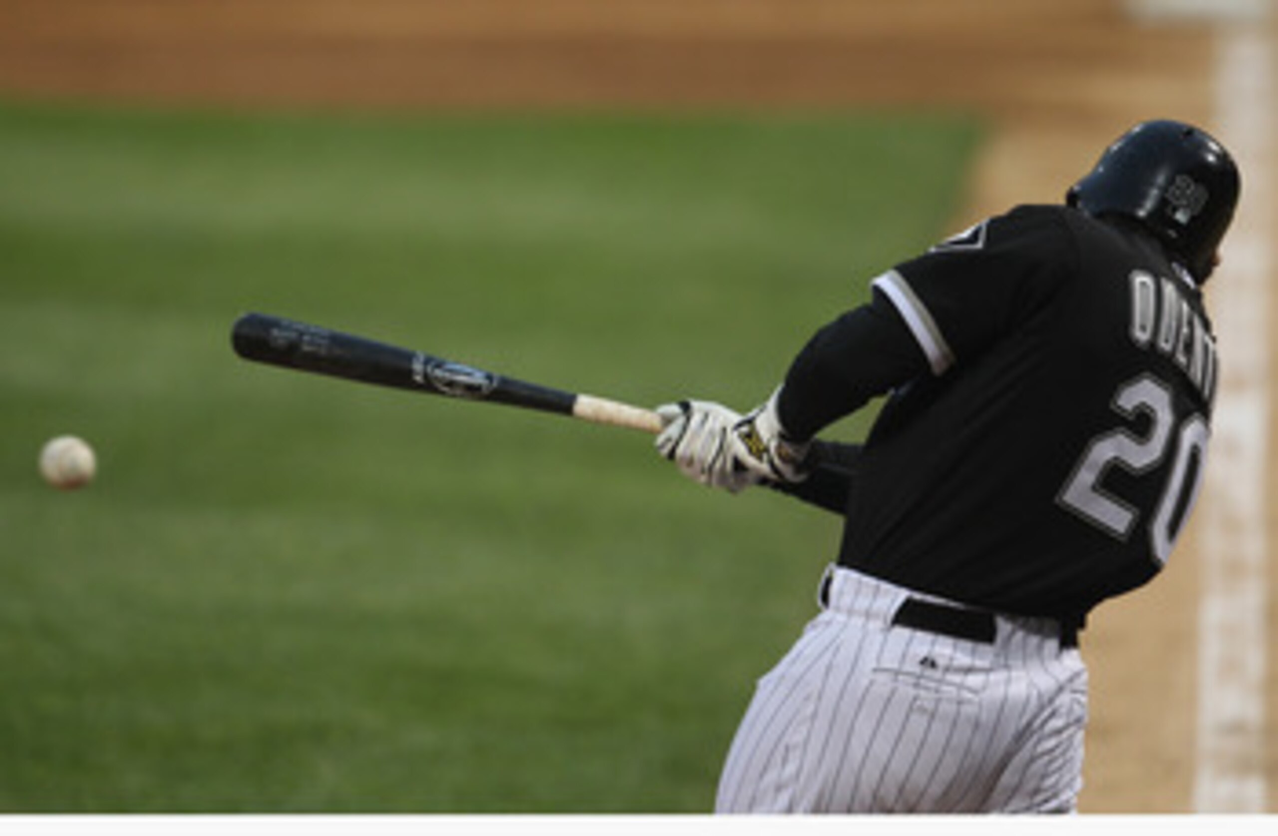 CHICAGO, IL - JUNE 10: Carlos Quentin #20 of the Chicago White Sox hits the ball against the Oakland Athletics at U.S. Cellular Field on June 10, 2011 in Chicago, Illinois. The Athletics defeated the White Sox 7-5. (Photo by Jonathan Daniel/Getty Images CHICAGO, IL - JUNE 10: Carlos Quentin #20 of the Chicago White Sox hits the ball against the Oakland Athletics at U.S. Cellular Field on June 10, 2011 in Chicago, Illinois. The Athletics defeated the White Sox 7-5. (Photo by Jonathan Daniel/Getty Images