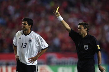 Urs Meier Shows the Card