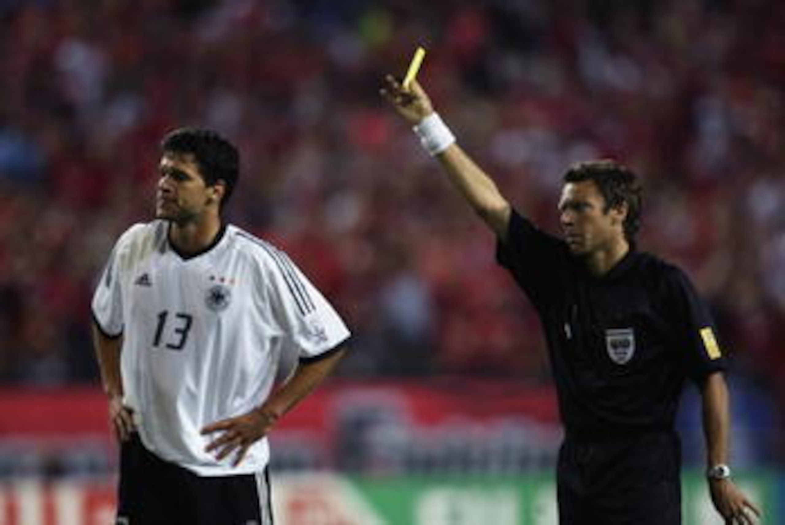 Urs Meier Shows the Card