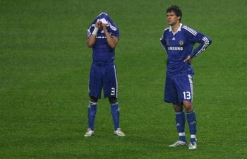 MOSCOW - MAY 21:  Dejected Chelsea teammates, Ashley Cole (L) and Michael Ballack look on following their team's 6-5 defeat in the penalty shootout during the UEFA Champions League Final match between Manchester United and Chelsea at the Luzhniki Stadium