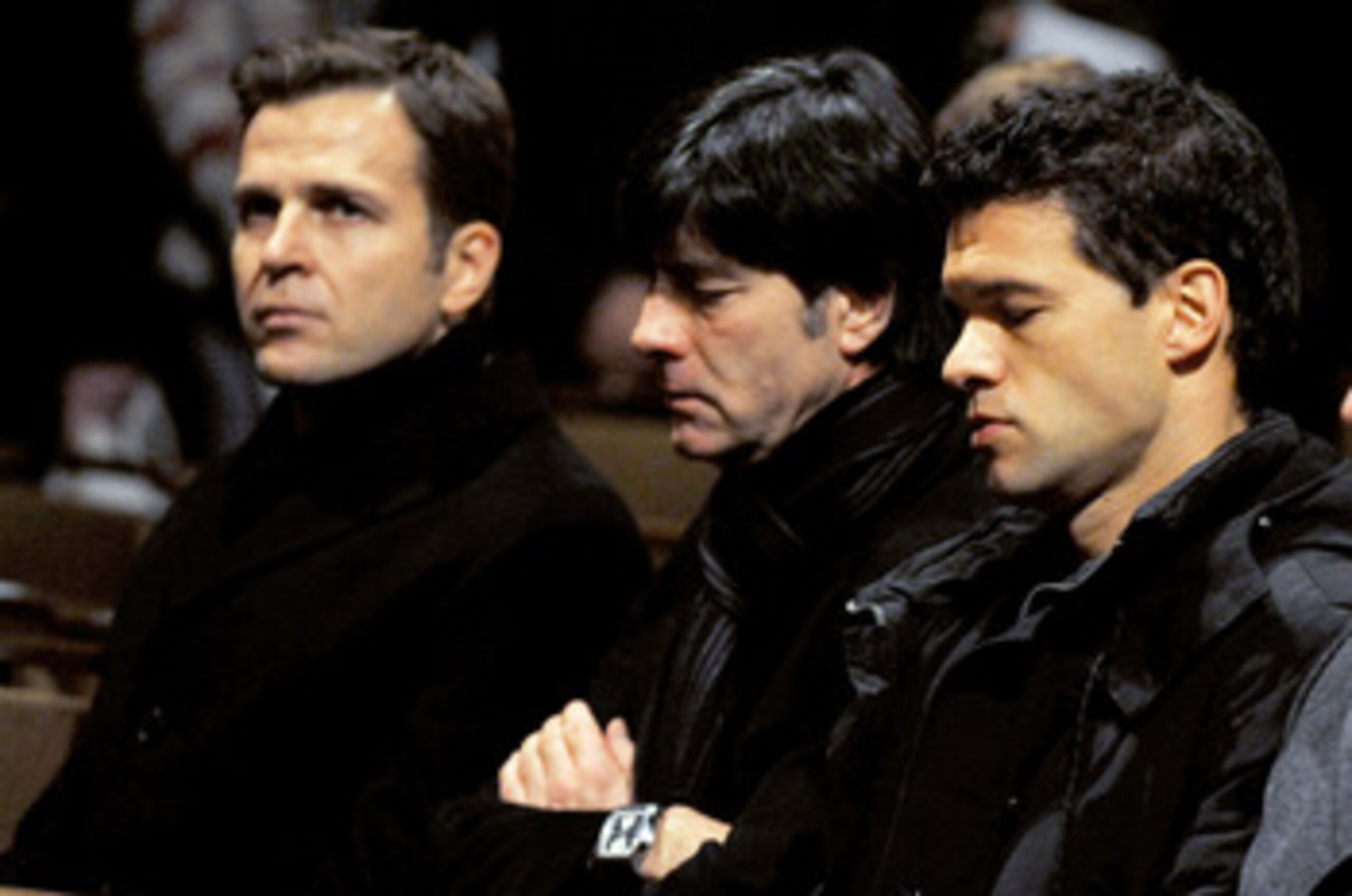 HANOVER, GERMANY - NOVEMBER 11:  (L-R)  Oliver Bierhoff, team manager of the german football assisation, Joachim Loew, head coach of the german national football team and Michael Ballack attend the mourning service for Robert Enke at the Marktkirche on No
