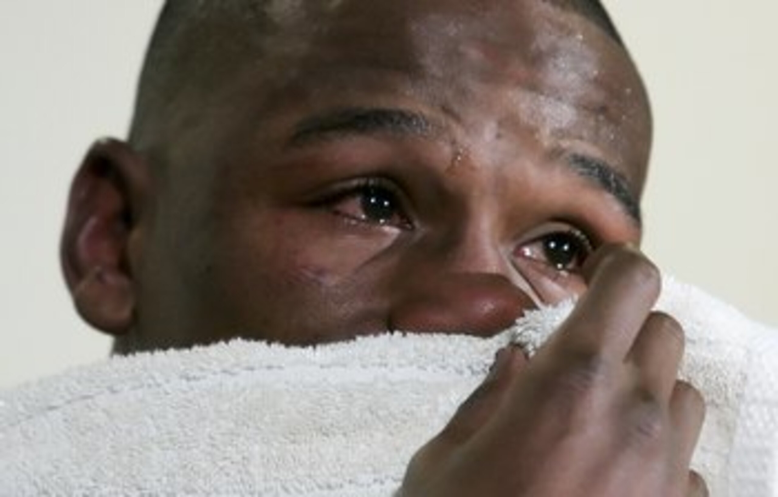 LAS VEGAS - NOVEMBER 04:  Floyd Mayweather Jr. cries during a post-fight news conference after defeating Carlos Baldomir of Argentina to claim the WBC welterweight championship at the Mandalay Bay Events Center November 4, 2006 in Las Vegas, Nevada. Maywe