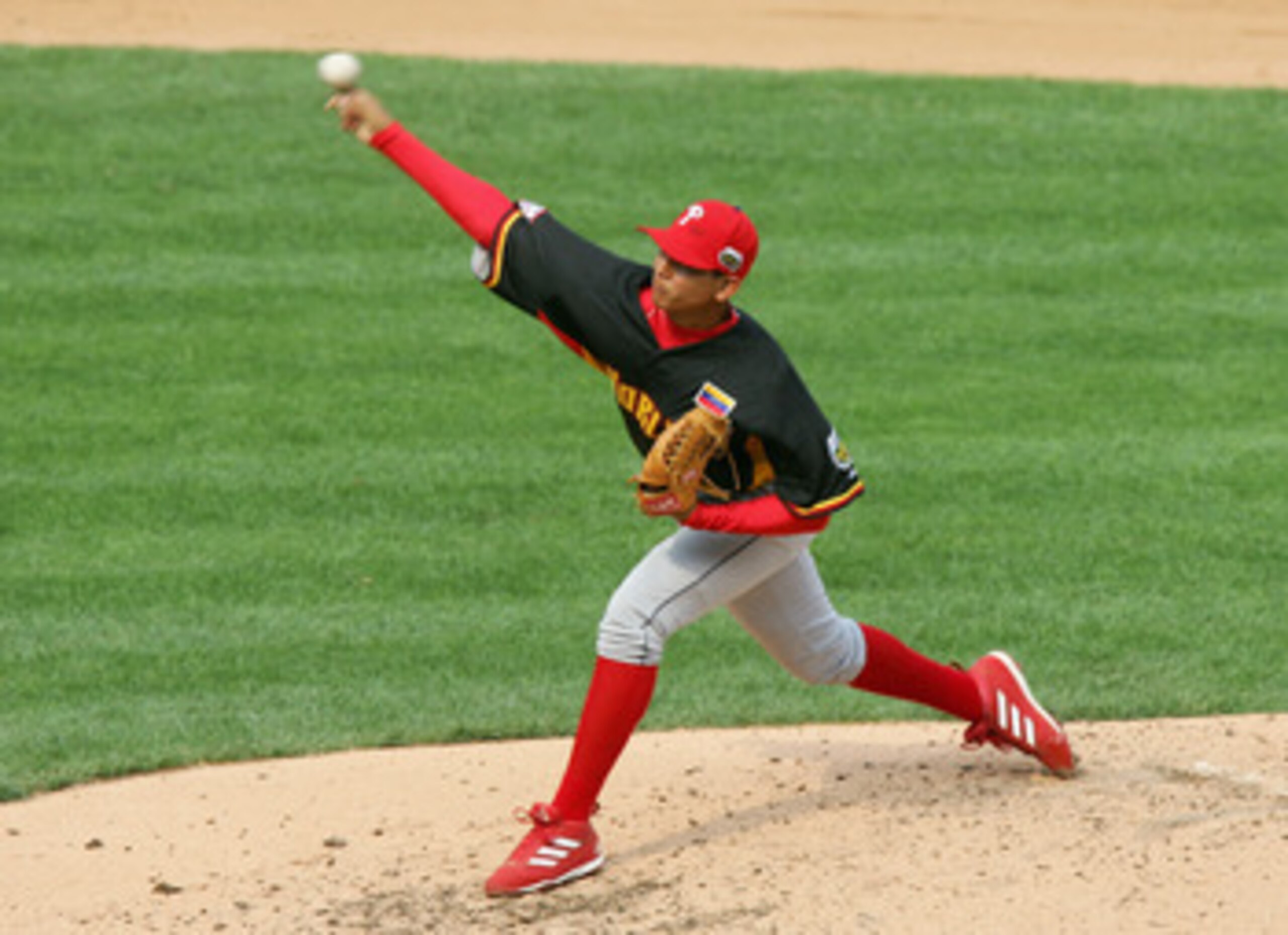 PITTSBURGH - JULY 09:  Carlos Carrasco #37 of the World Team pitches against the U.S.A. Team during the XM Satellite Radio All-Star Futures Game at PNC Park on July 9, 2006 in Pittsburgh, Pennsylvania.  (Photo by Jim McIsaac/Getty Images)