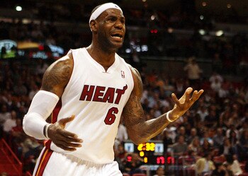 MIAMI - NOVEMBER 13:  Forward LeBron James #6 of the Miami Heat complains  against the Toronto Raptors at American Airlines Arena on November 13, 2010 in Miami, Florida. NOTE TO USER: User expressly acknowledges and agrees that, by downloading and or usin