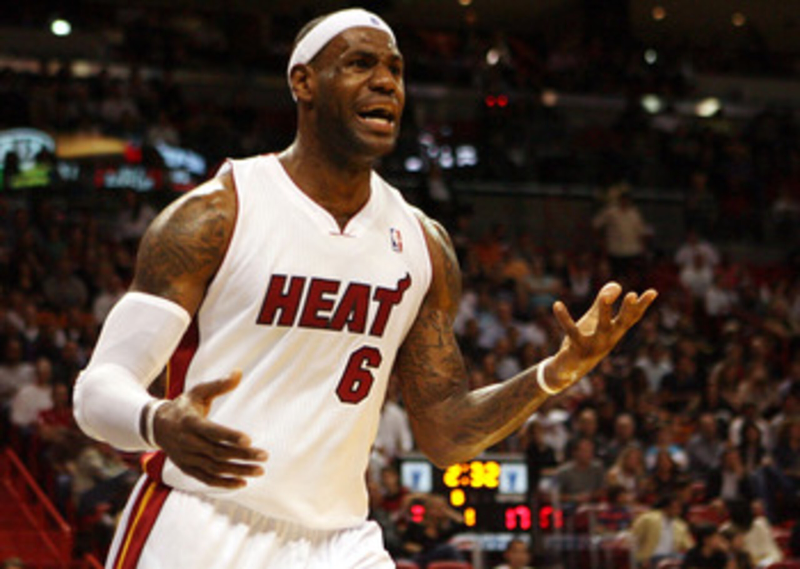 MIAMI - NOVEMBER 13:  Forward LeBron James #6 of the Miami Heat complains  against the Toronto Raptors at American Airlines Arena on November 13, 2010 in Miami, Florida. NOTE TO USER: User expressly acknowledges and agrees that, by downloading and or usin