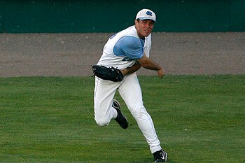 OMAHA, NE - JUNE 24:  Rightfielder Tim Fedroff #16 of the North Carolina Tar Heels tosses a ball in from the outfield during their 9-3 loss to the Oregon State Beavers in Game 2 of the NCAA College World Series Championship at Rosenblatt Stadium on June 2