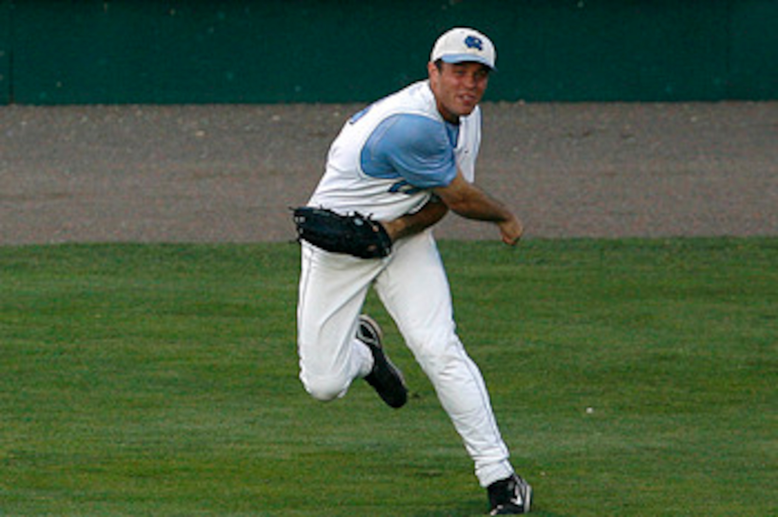 OMAHA, NE - JUNE 24:  Rightfielder Tim Fedroff #16 of the North Carolina Tar Heels tosses a ball in from the outfield during their 9-3 loss to the Oregon State Beavers in Game 2 of the NCAA College World Series Championship at Rosenblatt Stadium on June 2