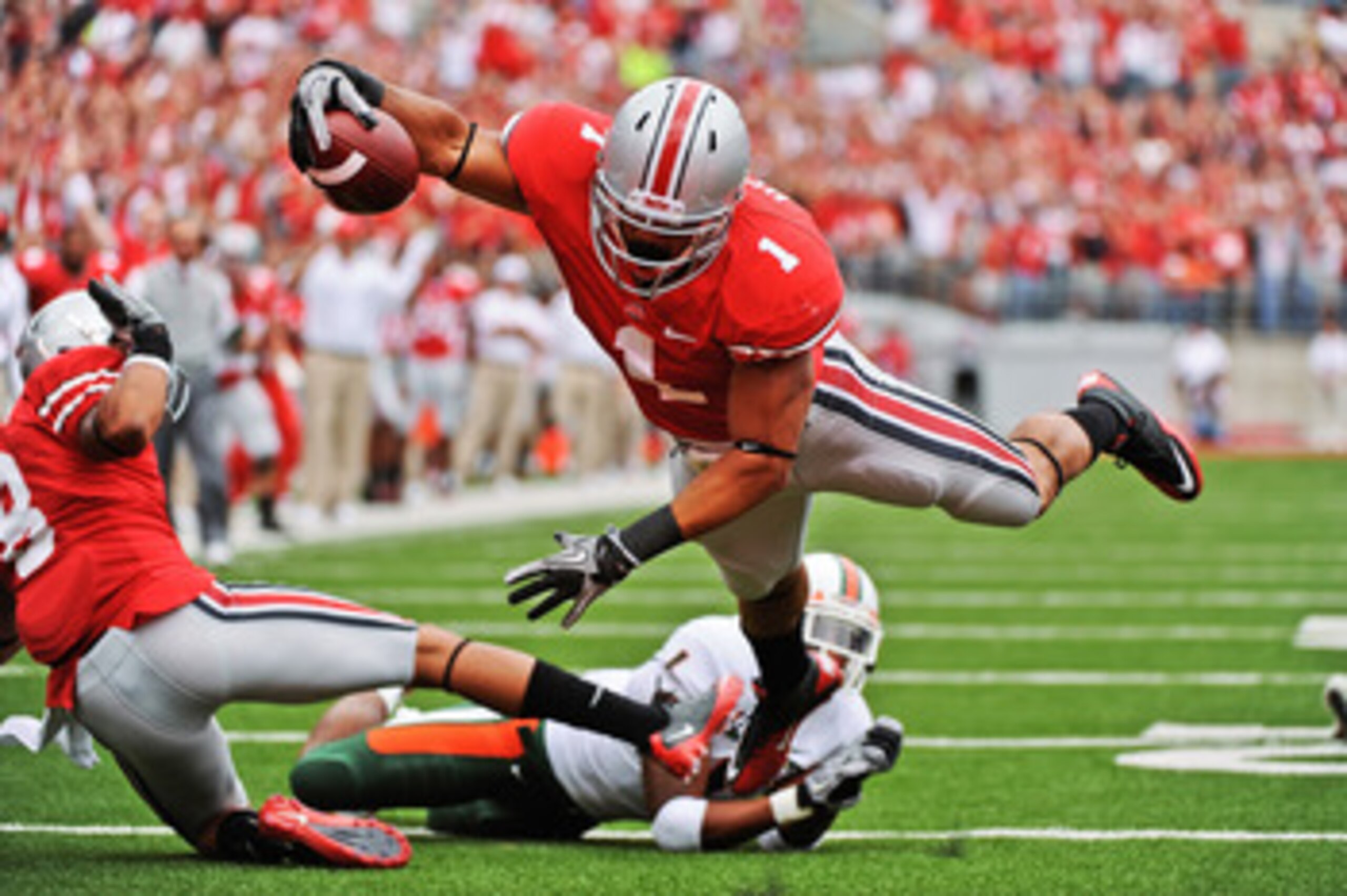 COLUMBUS, OH - SEPTEMBER 11:  Dan Herron #1 of the Ohio State Buckeyes runs with the ball against the Miami Hurricanes at Ohio Stadium on September 11, 2010 in Columbus, Ohio.  (Photo by Jamie Sabau/Getty Images)