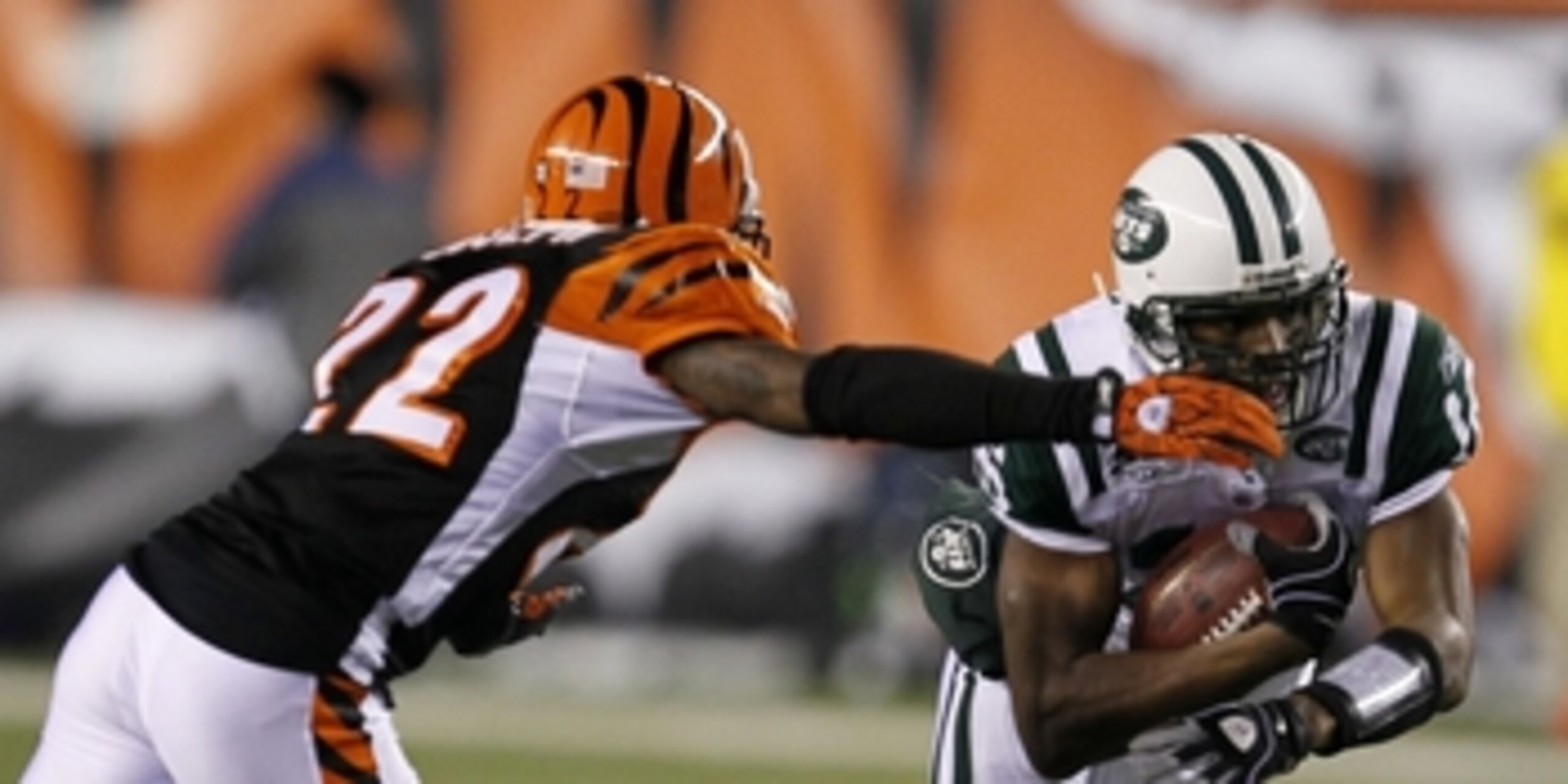 CINCINNATI - JANUARY 9: Brad Smith #16 of the New York Jets runs the ball against Johnathan Joseph #22 of the Cincinnati Bengals during the 2010 AFC wild-card playoff game at Paul Brown Stadium on January 9, 2010 in Cincinnati, Ohio. (Photo by Jonathan D CINCINNATI - JANUARY 9: Brad Smith #16 of the New York Jets runs the ball against Johnathan Joseph #22 of the Cincinnati Bengals during the 2010 AFC wild-card playoff game at Paul Brown Stadium on January 9, 2010 in Cincinnati, Ohio. (Photo by Jonathan D