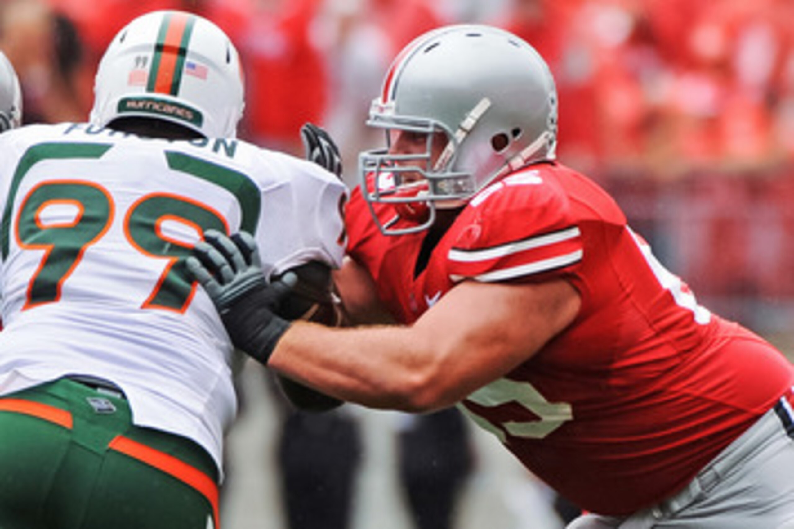 COLUMBUS, OH - SEPTEMBER 11:  Justin Boren #65 of the Ohio State Buckeyes blocks against the Miami Hurricanes at Ohio Stadium on September 11, 2010 in Columbus, Ohio.  (Photo by Jamie Sabau/Getty Images)