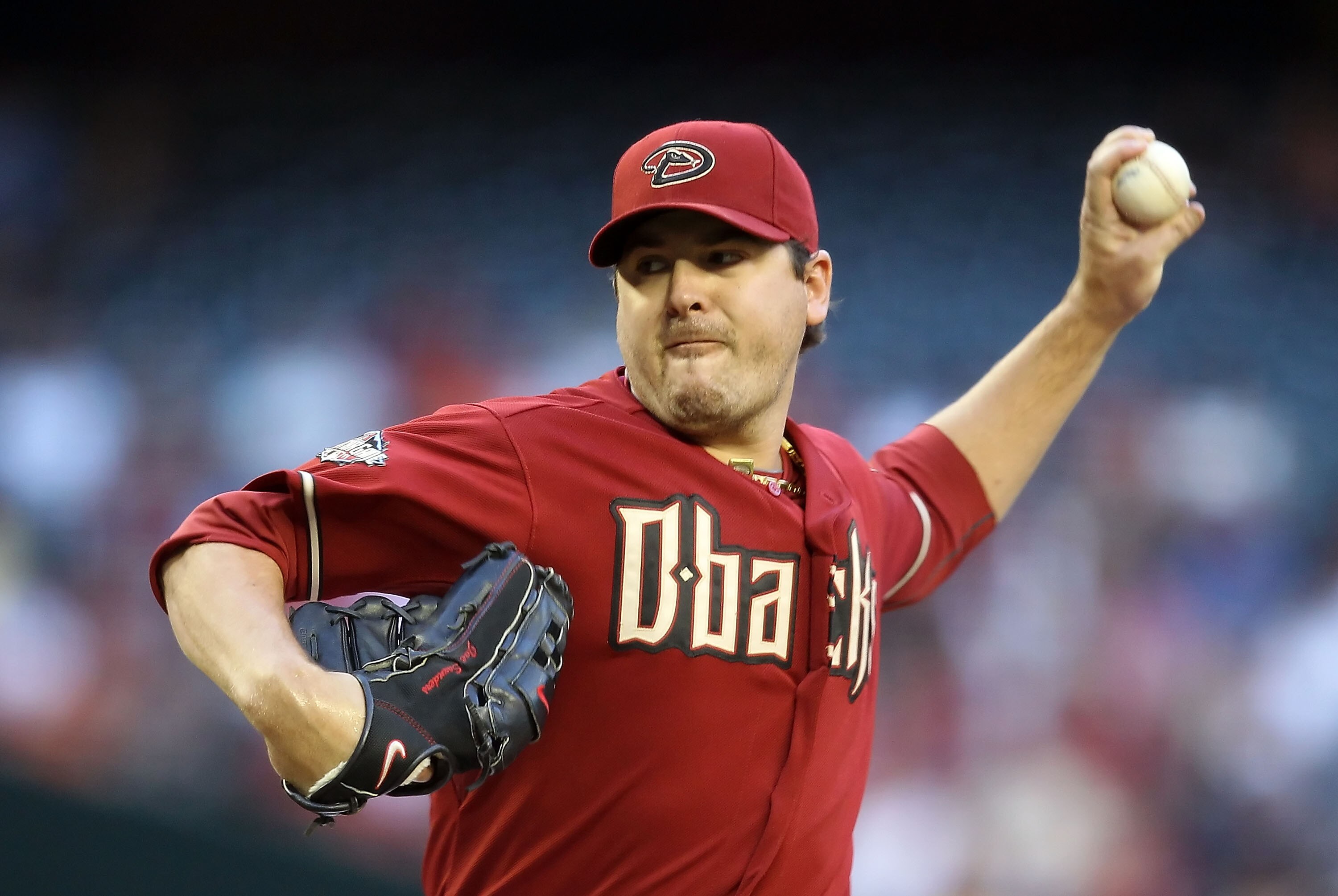 PHOENIX, AZ - JUNE 15: Starting pitcher Joe Saunders #34 of the Arizona Diamondbacks pitches against the San Francisco Giants during the Major League Baseball game at Chase Field on June 15, 2011 in Phoenix, Arizona. (Photo by Christian Petersen/Getty I PHOENIX, AZ - JUNE 15: Starting pitcher Joe Saunders #34 of the Arizona Diamondbacks pitches against the San Francisco Giants during the Major League Baseball game at Chase Field on June 15, 2011 in Phoenix, Arizona. (Photo by Christian Petersen/Getty I