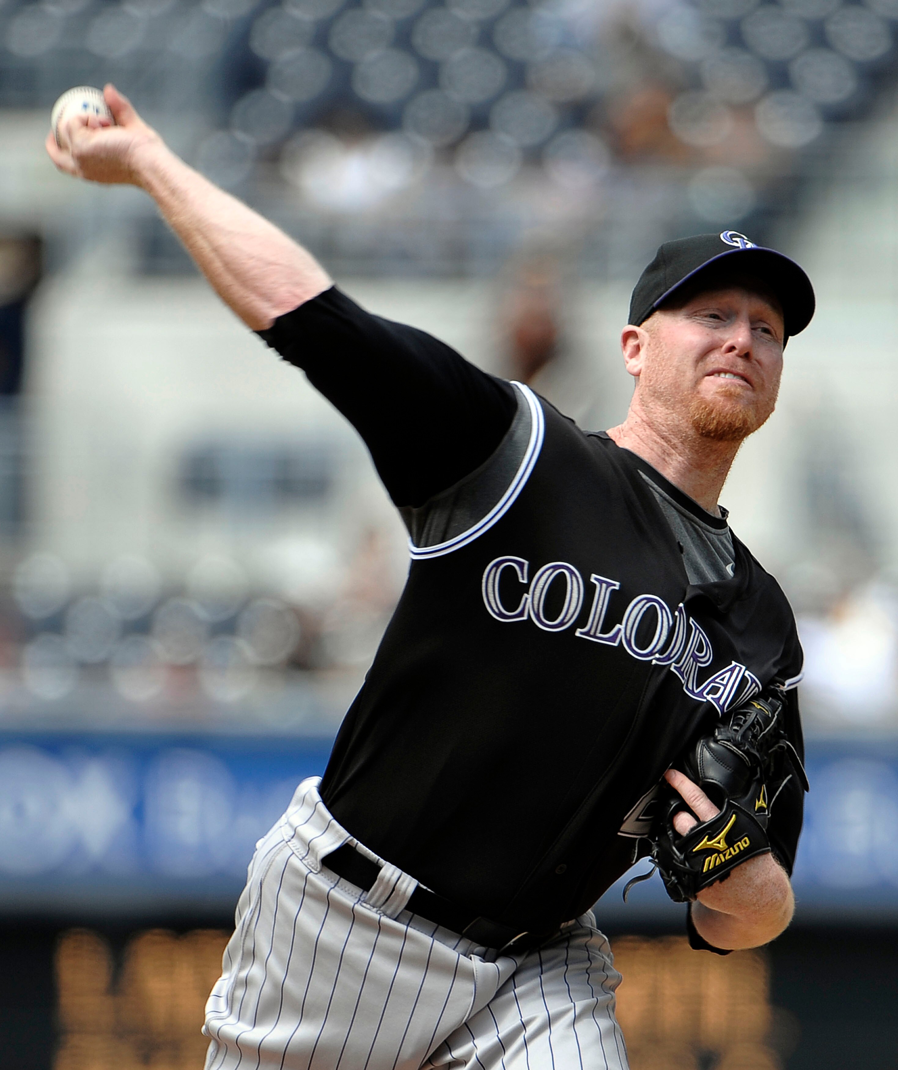 SAN DIEGO, CA - JUNE 8: Aaron Cook #28 of the Colorado Rockies pitches during the first inning of a baseball game against the San Diego Padres at Petco Park on June 8, 2011 in San Diego, California. (Photo by Denis Poroy/Getty Images) SAN DIEGO, CA - JUNE 8: Aaron Cook #28 of the Colorado Rockies pitches during the first inning of a baseball game against the San Diego Padres at Petco Park on June 8, 2011 in San Diego, California. (Photo by Denis Poroy/Getty Images)