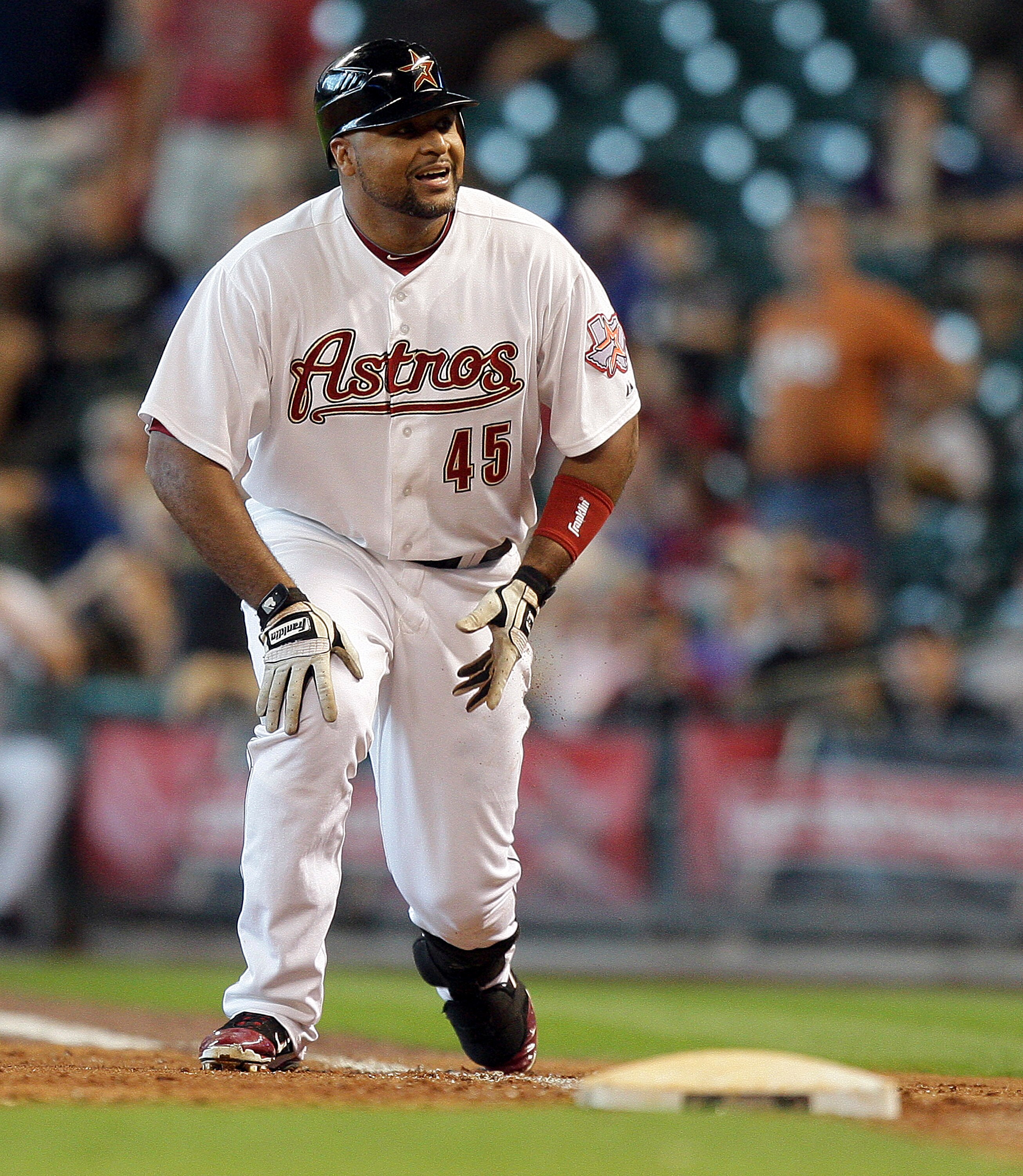 HOUSTON - JUNE 16: Carlos Lee #45 of the Houston Astros reacts after being called out at first base on a close call that ended the game against the Pittsburgh Pirates at Minute Maid Park on June 16, 2011 in Houston, Texas. (Photo by Bob Levey/Getty Ima HOUSTON - JUNE 16: Carlos Lee #45 of the Houston Astros reacts after being called out at first base on a close call that ended the game against the Pittsburgh Pirates at Minute Maid Park on June 16, 2011 in Houston, Texas. (Photo by Bob Levey/Getty Ima