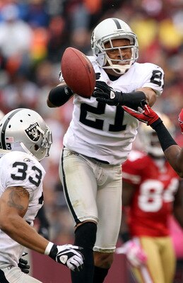 SAN FRANCISCO - OCTOBER 17:  Nnamdi Asomugha  #21 of the Oakland Raiders breaks up a pass intended for Michael Crabtree #15 of the San Francisco 49ers at Candlestick Park on October 17, 2010 in San Francisco, California.  (Photo by Ezra Shaw/Getty Images)