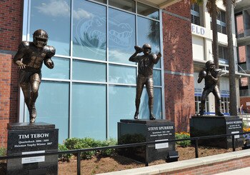 GAINESVILLE, FL - APRIL 9: Life-size statues of the Florida Gators three Heisman trophy winners  - Tim Tebow, Danny Wuerffel and Steve Spurrier - are unvelied at halftime of the Orange and Blue spring football game April 9, 2011 Ben Hill Griffin Stadium a