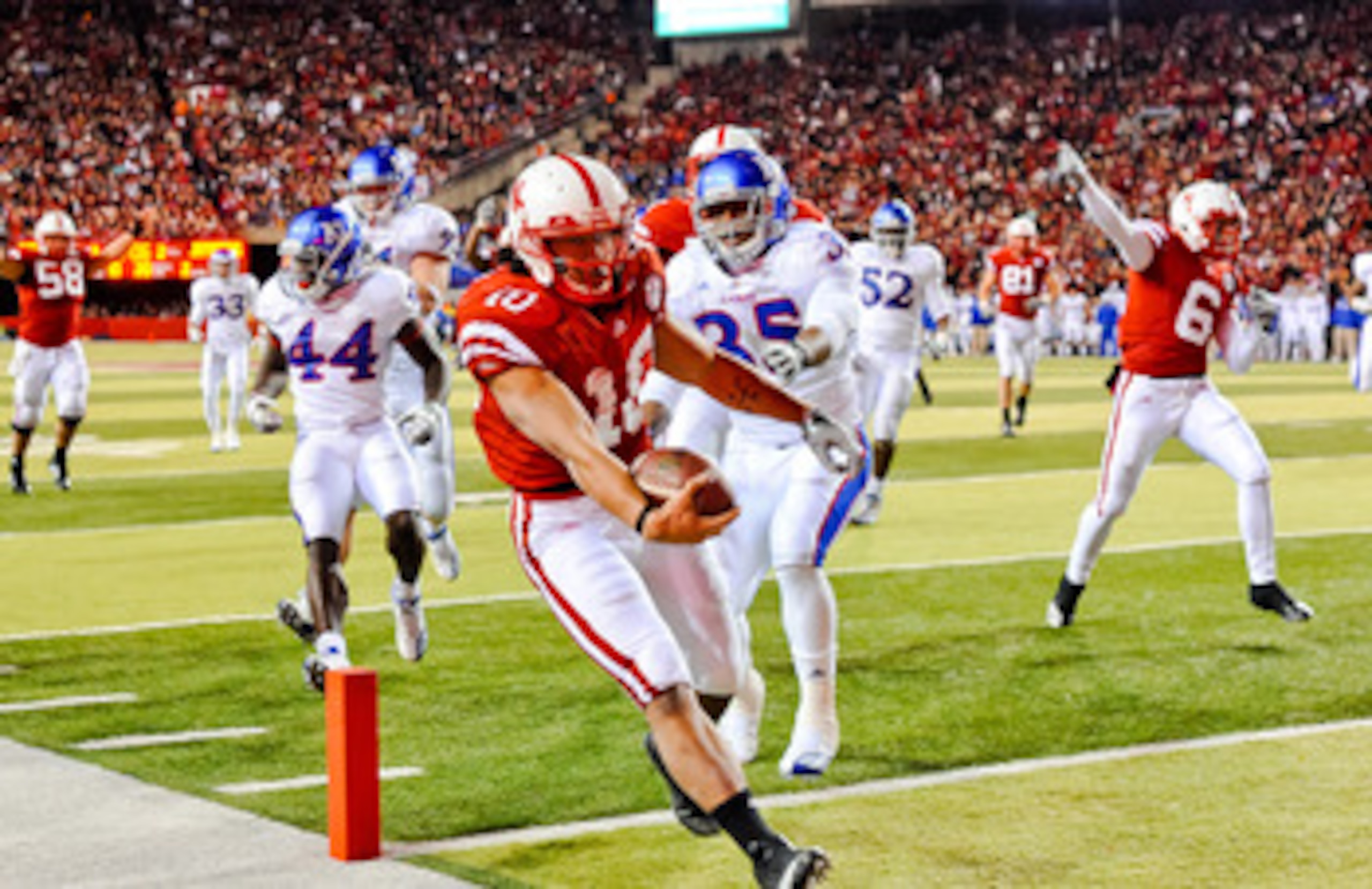 LINCOLN, NE - NOVEMBER 13: Roy Helu Jr. #10 of the Nebraska Cornhuskers runs for the endzone the Kansas Jayhawks during their game at Memorial Stadium on November 13, 2010 in Lincoln, Nebraska. Nebraska Defeated Kansas 20-3. (Photo by Eric Francis/Getty I