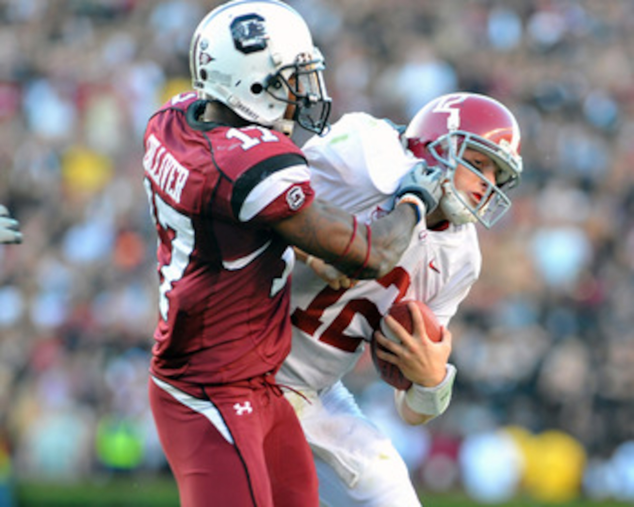 COLUMBIA, SC - OCTOBER 9: Defensive back Chris Culliver #17 of the Carolina Gamecocks tackles quarterback Greg McElroy of the Alabama Crimson Tide October 9, 2010 at Williams-Brice Stadium in Columbia, South Carolina.  (Photo by Al Messerschmidt/Getty Ima