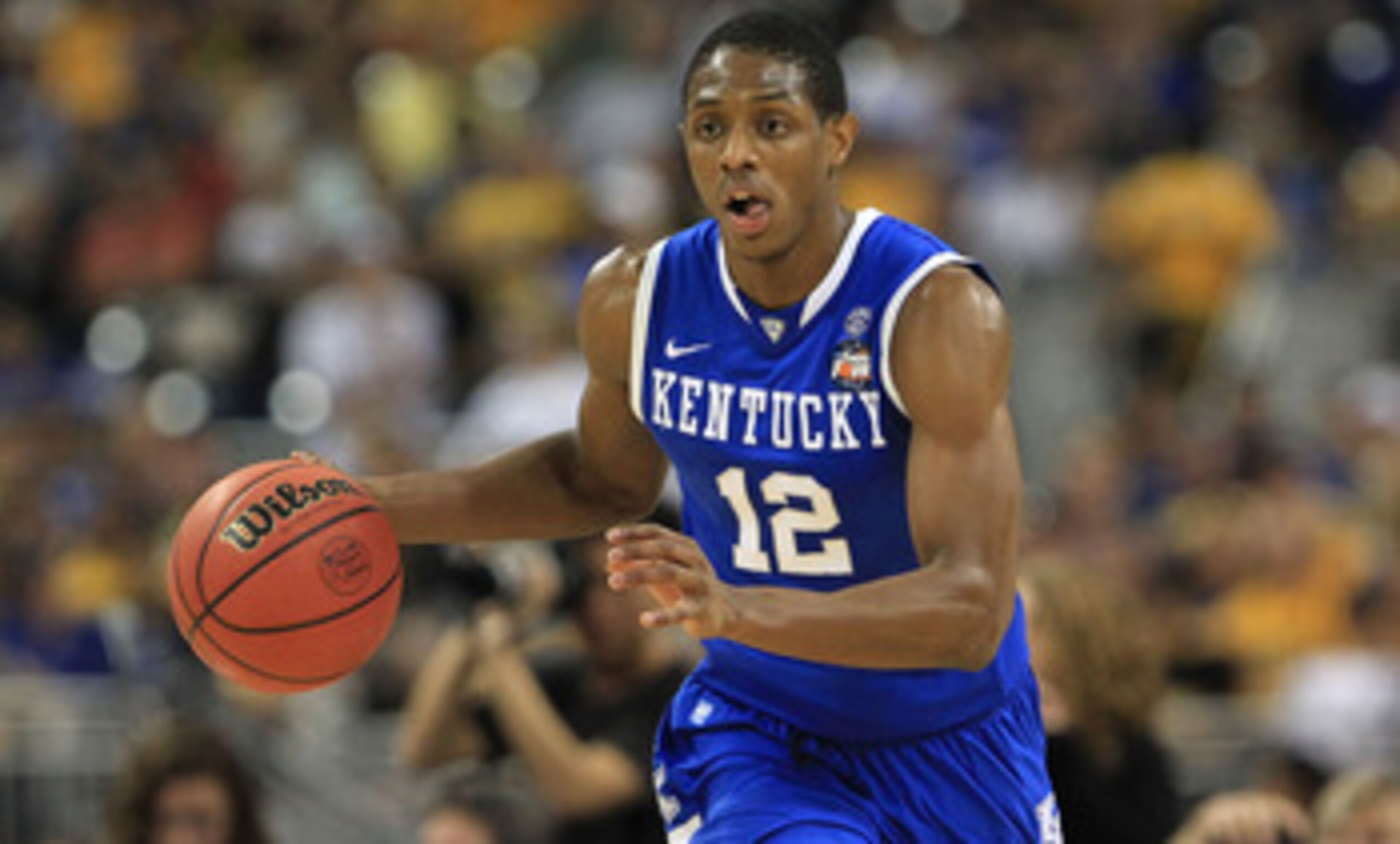 HOUSTON, TX - APRIL 02:  Brandon Knight #12 of the Kentucky Wildcats moves the ball while taking on the Connecticut Huskies during the National Semifinal game of the 2011 NCAA Division I Men's Basketball Championship at Reliant Stadium on April 2, 2011 in