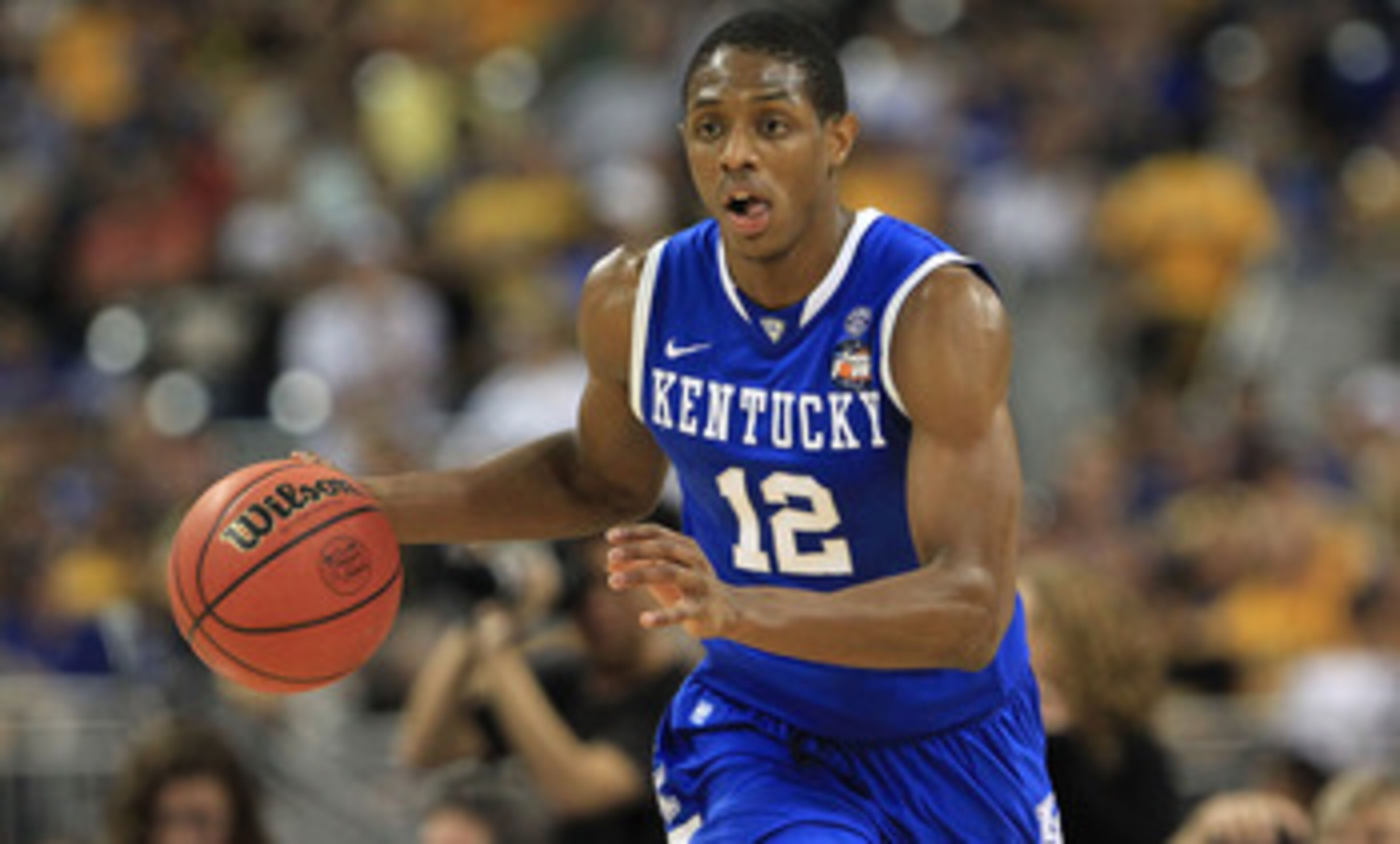 HOUSTON, TX - APRIL 02:  Brandon Knight #12 of the Kentucky Wildcats moves the ball while taking on the Connecticut Huskies during the National Semifinal game of the 2011 NCAA Division I Men's Basketball Championship at Reliant Stadium on April 2, 2011 in