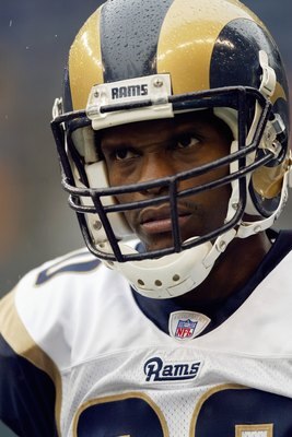 SEATTLE - NOVEMBER 12:  Wide receiver Isaac Bruce #80 of the St. Louis Rams stands in the rain during the NFL game against the Seattle Seahawks at Qwest Field on November 12, 2006 in Seattle, Washington. The Seahawks won 24-22. (Photo by Otto Greule Jr/Ge