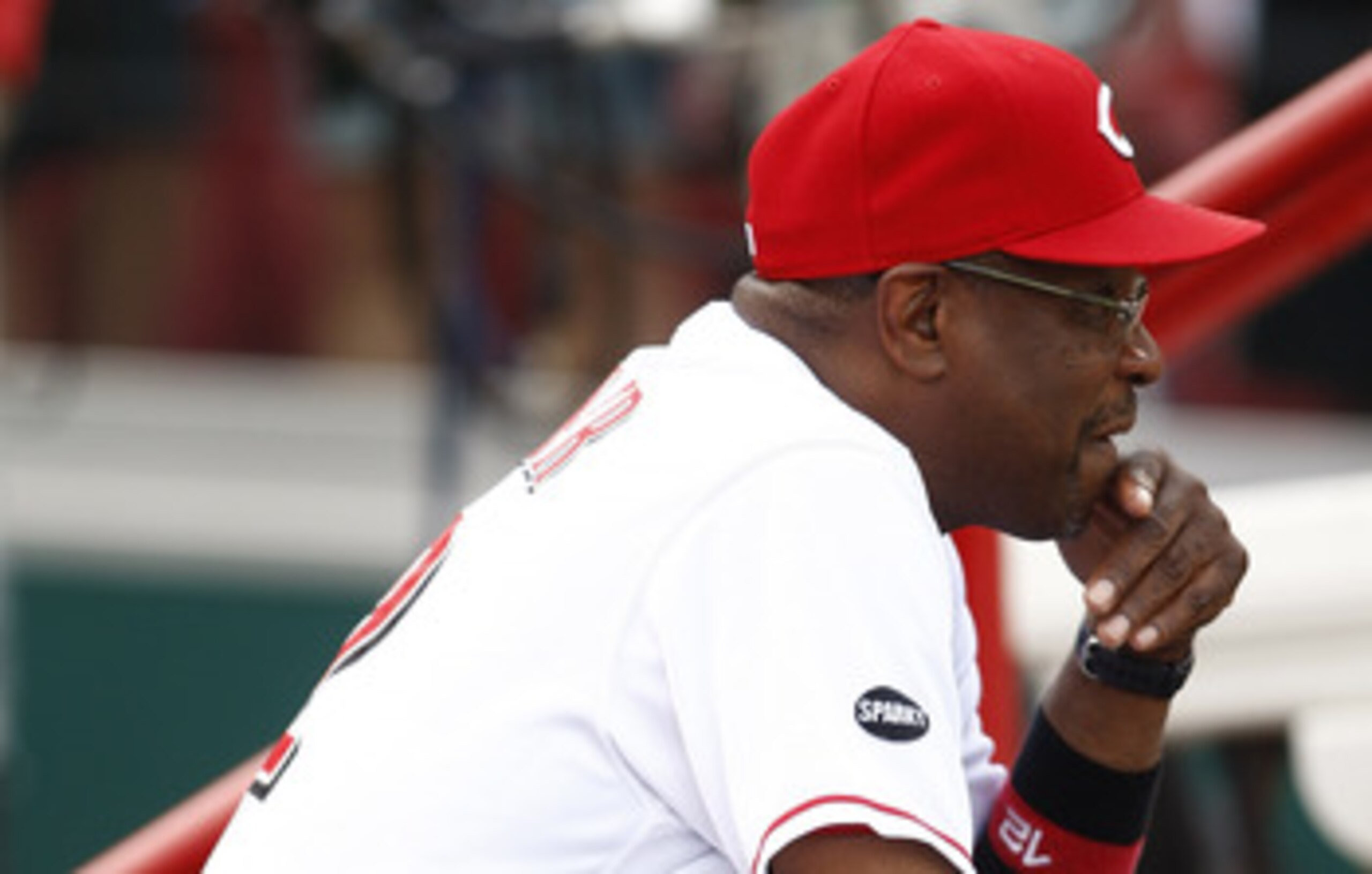 CINCINNATI, OH - JUNE 17: Manager Dusty Baker #12 of the Cincinnati Reds watches his team during the game against the Toronto Blue Jays on June 17, 2011 at Great American Ball Park in Cincinnati, Ohio. The Toronto Blue Jays defeated the Cincinnati Reds CINCINNATI, OH - JUNE 17: Manager Dusty Baker #12 of the Cincinnati Reds watches his team during the game against the Toronto Blue Jays on June 17, 2011 at Great American Ball Park in Cincinnati, Ohio. The Toronto Blue Jays defeated the Cincinnati Reds