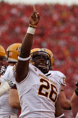 MADISON, WI - SEPTEMBER 18: Cameron Marshall #26 of the Arizona State Sun Devils celebrates scoring a touchdown in the 4th quarter against the Wisconsin Badgers at Camp Randall Stadium on September 18, 2010 in Madison, Wisconsin. Wisconsin defeated Arizon