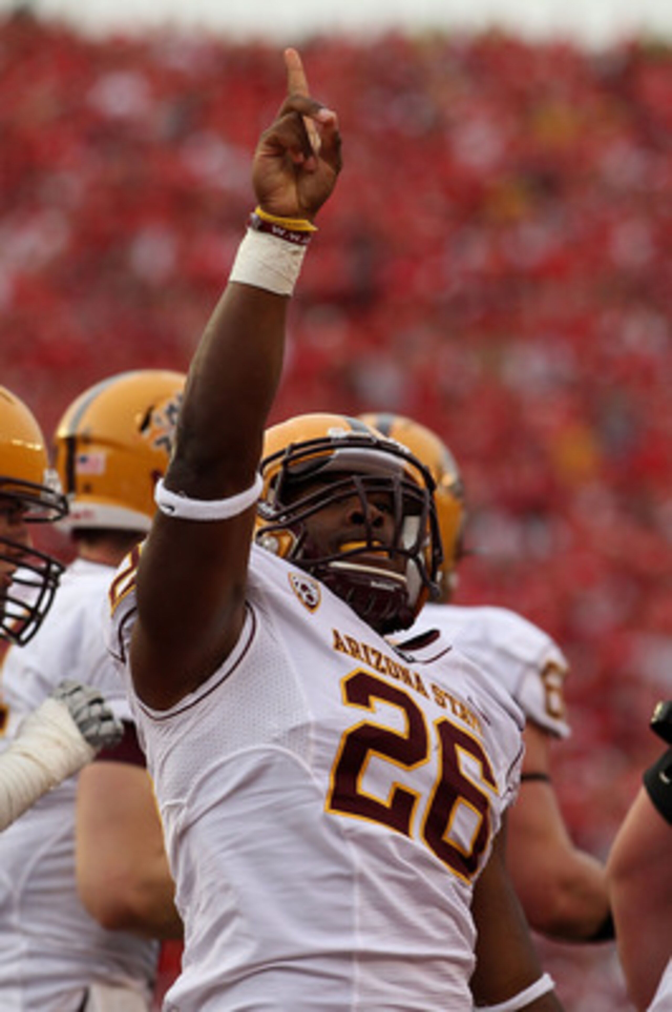 MADISON, WI - SEPTEMBER 18: Cameron Marshall #26 of the Arizona State Sun Devils celebrates scoring a touchdown in the 4th quarter against the Wisconsin Badgers at Camp Randall Stadium on September 18, 2010 in Madison, Wisconsin. Wisconsin defeated Arizon MADISON, WI - SEPTEMBER 18: Cameron Marshall #26 of the Arizona State Sun Devils celebrates scoring a touchdown in the 4th quarter against the Wisconsin Badgers at Camp Randall Stadium on September 18, 2010 in Madison, Wisconsin. Wisconsin defeated Arizon