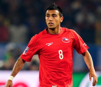 PRETORIA, SOUTH AFRICA - JUNE 25: Arturo Vidal of Chile in action during the 2010 FIFA World Cup South Africa Group H match between Chile and Spain at Loftus Versfeld Stadium on June 25, 2010 in Tshwane/Pretoria, South Africa.  (Photo by Stuart Franklin/G