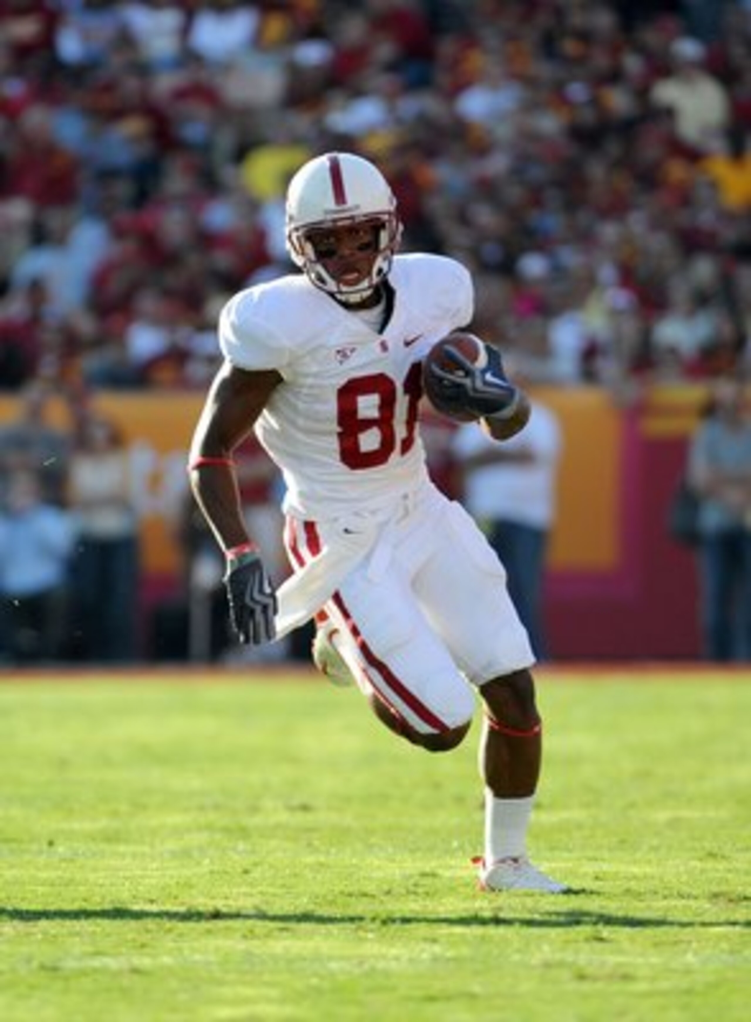 LOS ANGELES, CA - NOVEMBER 14: Chris Owusu #81 of the Stanford Cardinals runs after his catch against the USC Trojans during the game at the Los Angeles Memorial Coliseum on November 14, 2009 in Los Angeles, California. (Photo by Harry How/Getty Images) LOS ANGELES, CA - NOVEMBER 14: Chris Owusu #81 of the Stanford Cardinals runs after his catch against the USC Trojans during the game at the Los Angeles Memorial Coliseum on November 14, 2009 in Los Angeles, California. (Photo by Harry How/Getty Images)