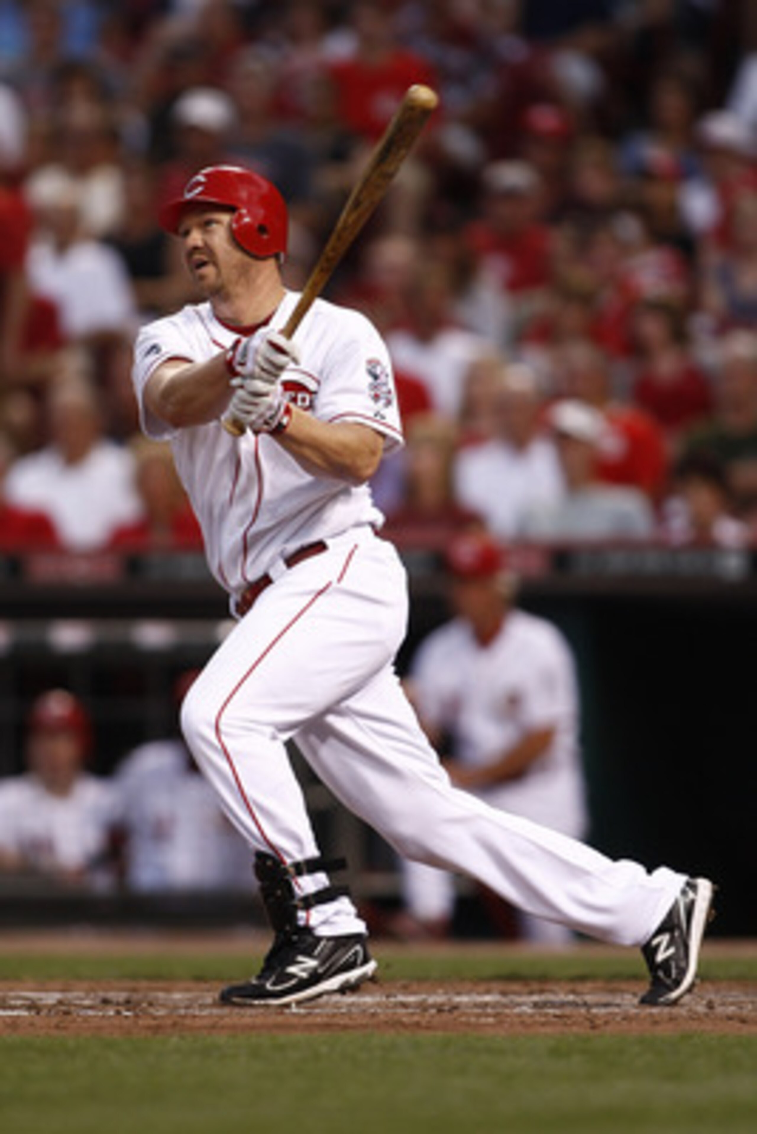 CINCINNATI, OH - JUNE 17: Scott Rolen #27 of the Cincinnati Reds hits a solo home run during the game against the Toronto Blue Jays on June 17, 2011 at Great American Ball Park in Cincinnati, Ohio. The Toronto Blue Jays defeated the Cincinnati Reds 3-2. CINCINNATI, OH - JUNE 17: Scott Rolen #27 of the Cincinnati Reds hits a solo home run during the game against the Toronto Blue Jays on June 17, 2011 at Great American Ball Park in Cincinnati, Ohio. The Toronto Blue Jays defeated the Cincinnati Reds 3-2.