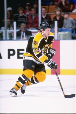 11 Apr 1997: Sheldon Kennedy of  the Boston Bruins controls the puck during the Bruins 2-0 loss to the New Jersey Devils at Contennental Airlines Arena in East Rutherford, New Jersey. Mandatory Credit: Rick Stewart  /Allsport