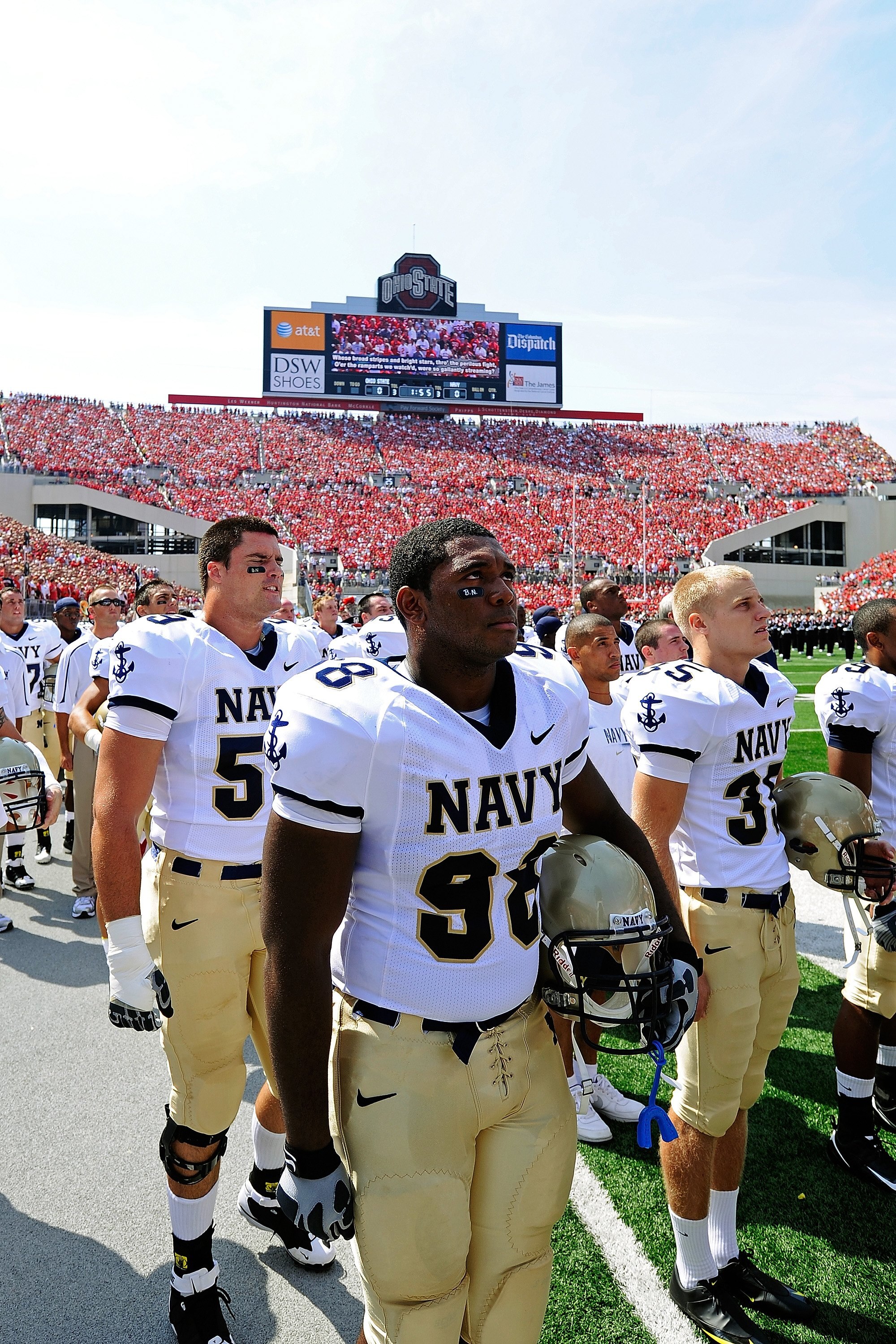COLUMBUS, OH - SEPTEMBER 05:  Jabaree Tuani #98 of the Navy Midshipmen listens to the National Anthem before the game against the Ohio State Buckeyes at Ohio Stadium on September 5, 2009 in Columbus, Ohio.  (Photo by Jamie Sabau/Getty Images)