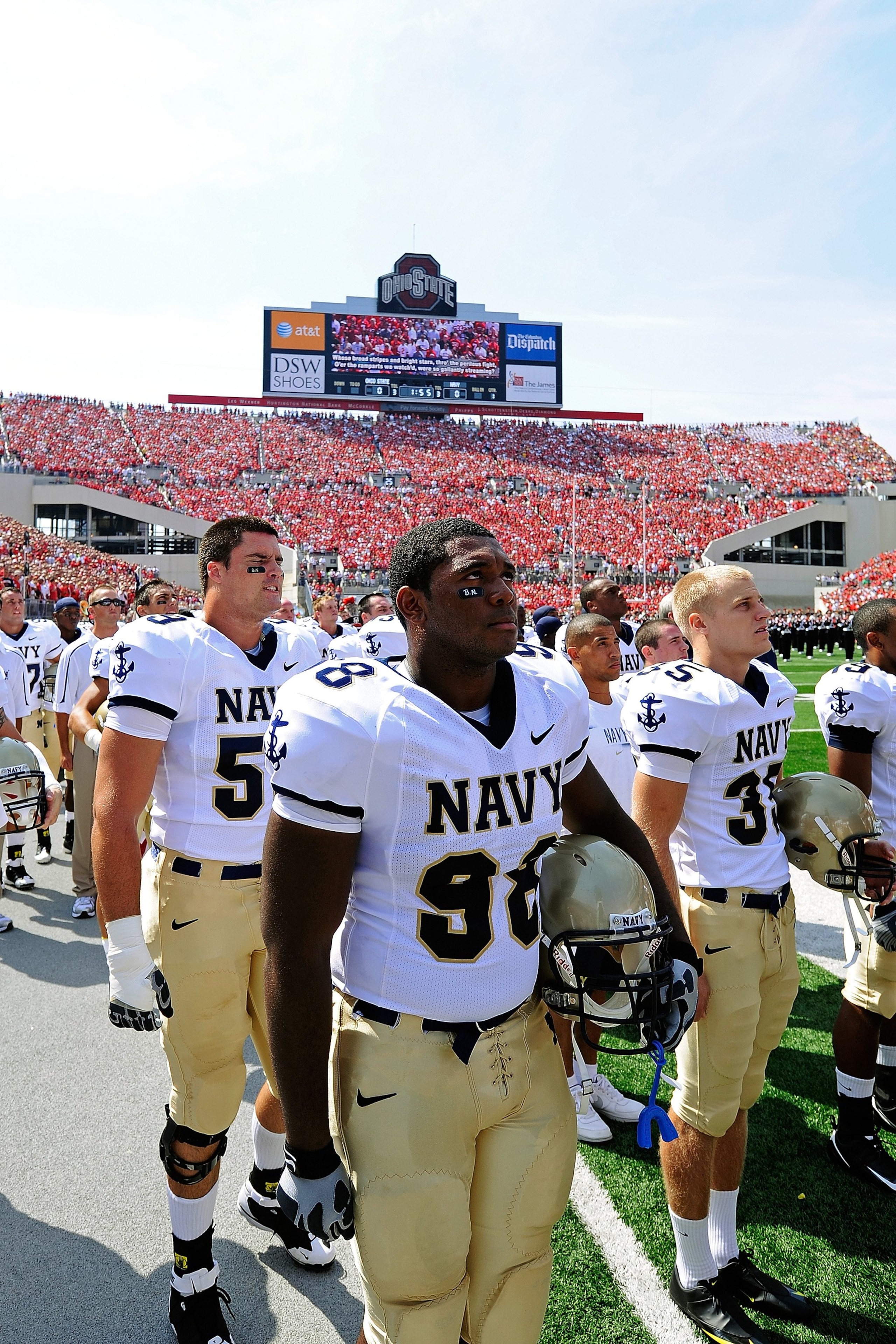 COLUMBUS, OH - SEPTEMBER 05:  Jabaree Tuani #98 of the Navy Midshipmen listens to the National Anthem before the game against the Ohio State Buckeyes at Ohio Stadium on September 5, 2009 in Columbus, Ohio.  (Photo by Jamie Sabau/Getty Images)