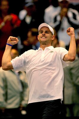 BIRMINGHAM, AL - MARCH 08:  Andy Roddick celebrates his win over Stanislas Wawrinka of Switzerland in the first set during the fourth rubber of their Davis Cup tie at Birmingham-Jefferson Convention Complex Arena March 8, 2009 in Birmingham, Alabama.  (Ph
