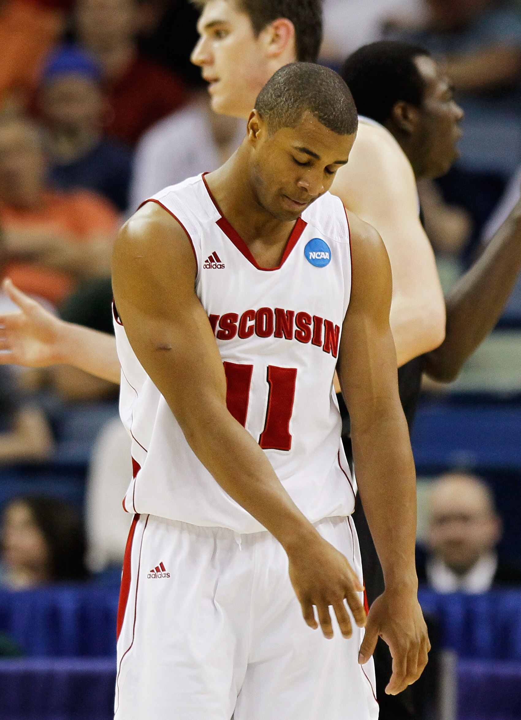 NEW ORLEANS, LA - MARCH 24:  Jordan Taylor #11 of the Wisconsin Badgers reacts after missing a basket against the Butler Bulldogs during the Southeast regional of the 2011 NCAA men's basketball tournament at New Orleans Arena on March 24, 2011 in New Orle