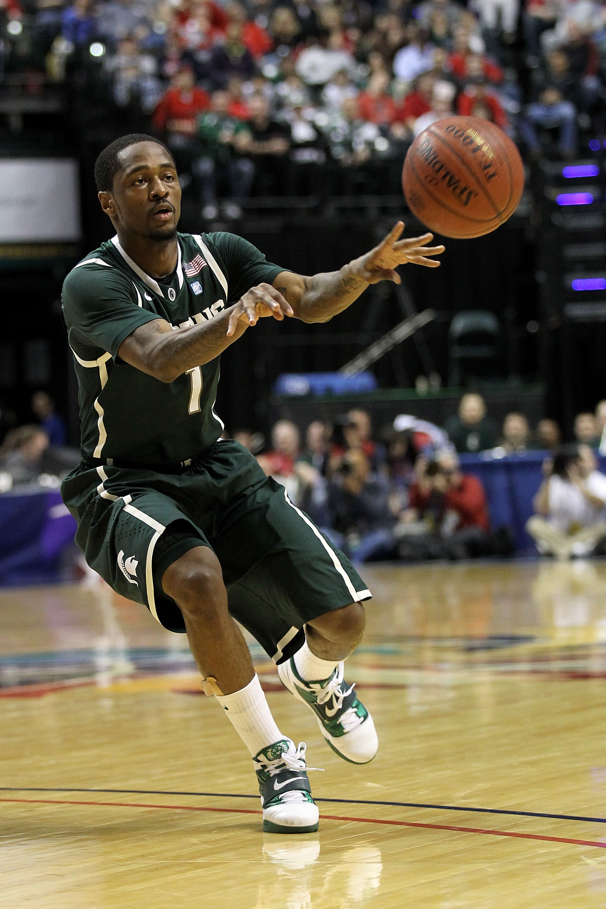 INDIANAPOLIS, IN - MARCH 12:  Kalin Lucas #1 of the Michigan State Spartans passes the ball against the Penn State Nittany Lions during the semifinals of the 2011 Big Ten Men's Basketball Tournament at Conseco Fieldhouse on March 12, 2011 in Indianapolis,