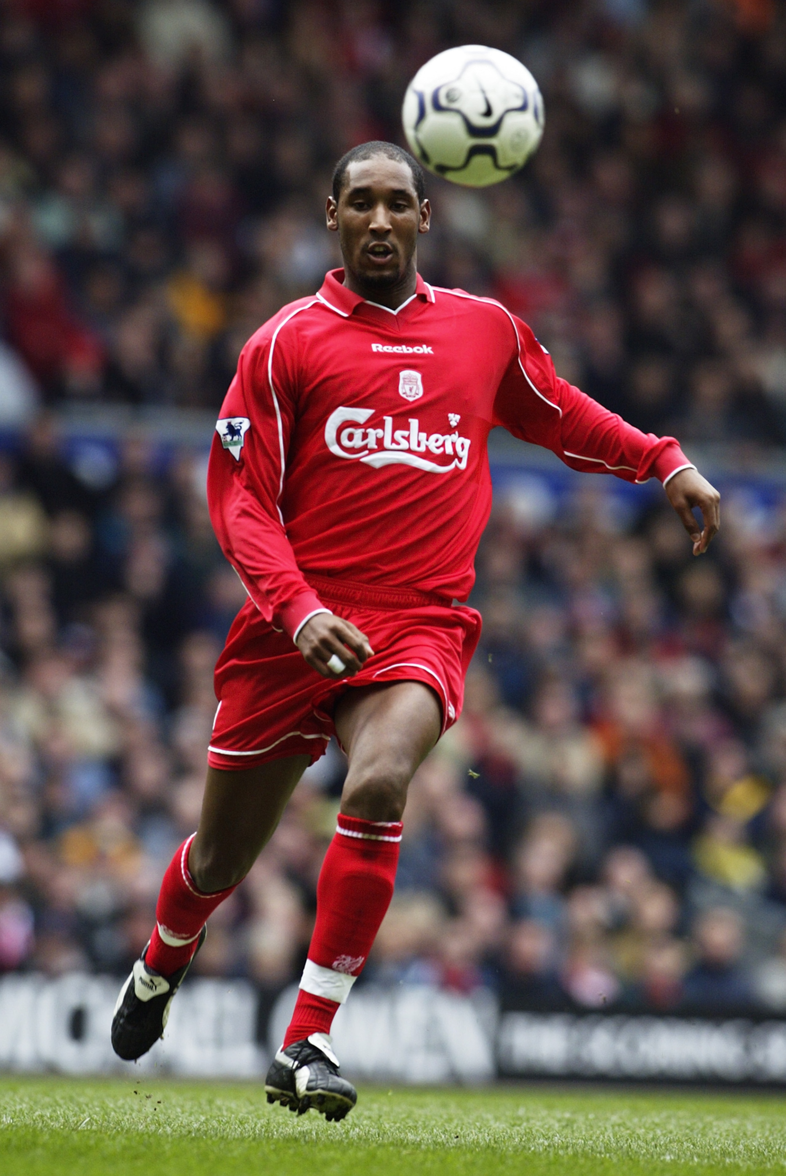 24 Mar 2002:  Nicolas Anelka of Liverpool charges forward during the FA Barclaycard Premiership match between Liverpool and Chelsea played at Anfield, in Liverpool, England. Liverpool won the match 1-0. DIGITAL IMAGE. \ Mandatory Credit: Laurence Griffith