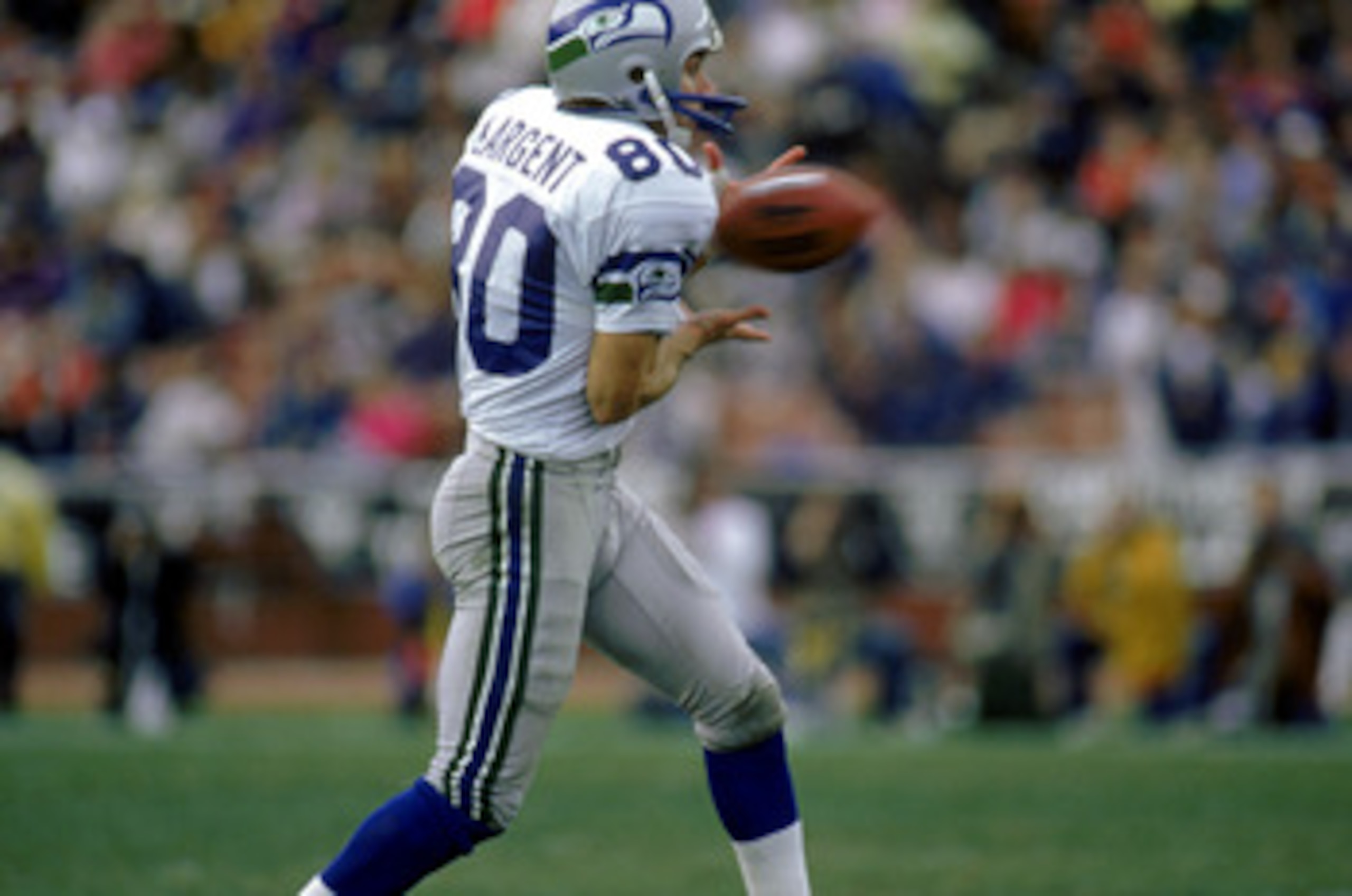 LOS ANGELES - DECEMBER 18:  Wide receiver Steve Largent #80 of the Seattle Seahawks catches a pass during a game against the Los Angeles Raiders at the L.A. Coliseum on December 18, 1988 in Los Angeles, California.  The Seahawks defeated the Raiders 43-37